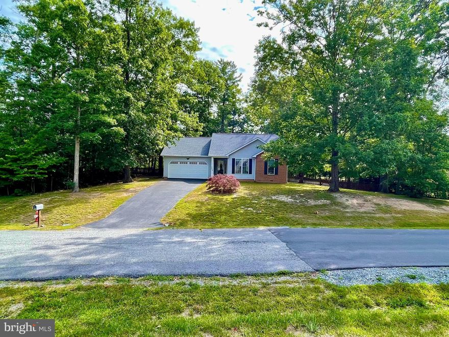 This beautiful rancher is back on the market!  Have you been looking or 1 level living that feels very secluded?   This is the place for you!  This sweet rancher has 3 Bedrooms, 2 Bathrooms, a large sunporch 2 car garage, very large fenced in back yard and a shed!  With a laundry room right off of the kitchen it has everything you could need!  This home is in the Hedgesville area, but not too far from schools and shopping.  You don't want to miss this one!  Schedule your appointment today!