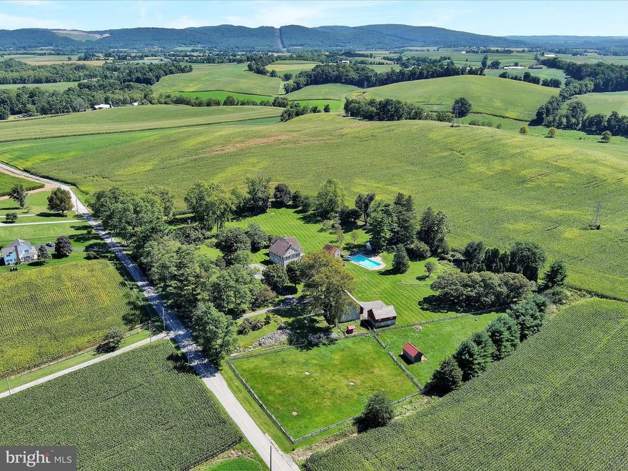 Welcome to historic Ha Penny Farm, a Georgian manor house and farmstead established in 1817. Located in Oley Valley, Ha Penny Farm  offers an opportunity to become the steward of one of Pennsylvania's truly notable and beautiful historic properties.  Founded as part of the Abraham Knabb farmstead, the nearly 8 acre setting is flanked by forested hills and picturesque Oley agricultural landscape. Oley Township  is well known for its rural landscapes, multiple well preserved buildings and Pennsylvania Dutch farms, and is famously one of the towns first listed in the National Registry of Historic Places. Dutifully preserved and updated throughout the last decade with current ownership having performed extensive renovations and preservations Ha Penny Farm offers a once in a lifetime opportunity. In addition to extensive interior renovations and preservations Ha Penny Farm has undergone an award winning multiple 6 figure restoration to the outbuildings all done with careful historic oversight. The main Pennsylvania German bank barn was described by one awarding judge as a jewel, and both barns are breathtaking and suitable for entertaining and enjoyment of ownership. Other outbuildings include the original  red clay tile roofed Summer kitchen, spring house,  charming hillside stone root cellar, and run in shed in the fenced pasture. Ha Penny Farm sits beautifully off of a picturesque country road with an unparalleled location offering undeniable privacy  while having easy access to highways and  amenities.  This is your opportunity to own this exquisite Oley estate, it is a property rich in history and undeniable beauty, schedule your private showing today and welcome yourself home to Ha Penny Farm!