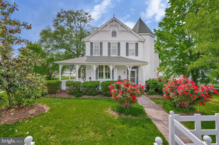 There are houses that provide shelter, then there are homes that tell a story. Step into the Smoot House, a La Plata landmark where 132 years of the town’s history reside within its walls. The exterior features a striking Victorian turret and an inviting, wide wrap around front porch. On entry, the original camphor glass windows cast soft light upon the grand stairway. To the left, is a study that offers a peaceful haven. The original dining room now serves as a family room, featuring an original working fireplace. Solid hardwood floors lead to the former kitchen, now an office, retaining its original pocket doors and a charming back staircase to the second floor. A modern kitchen addition creates a comfortable gathering area where there is room not only for dining, but for seating around a modern gas fireplace.
The extra wide hallway on the second floor features a charming seating nook with a large window overlooking the town. There are three bedrooms on the second floor. The primary includes an attached full bath, and original fireplace mantel as does a second bedroom, adding historical touches. A third staircase on this floor leads to an attic bedroom where there is plenty of storage. 
The large yard is almost one-half acre. The property still has the original carriage house, that was once used as an office. It has electricity and an old fireplace with mantel. Three generations of the Smoot family lived in this home. It has weathered two tornado, captured the hearts of artists, and graced the pages of numerous publications. The current owners acquired the home after it was restored in 2006, creating a comfortable home with modern amenities.  This home is not just a house but a rare opportunity to own a piece of history.