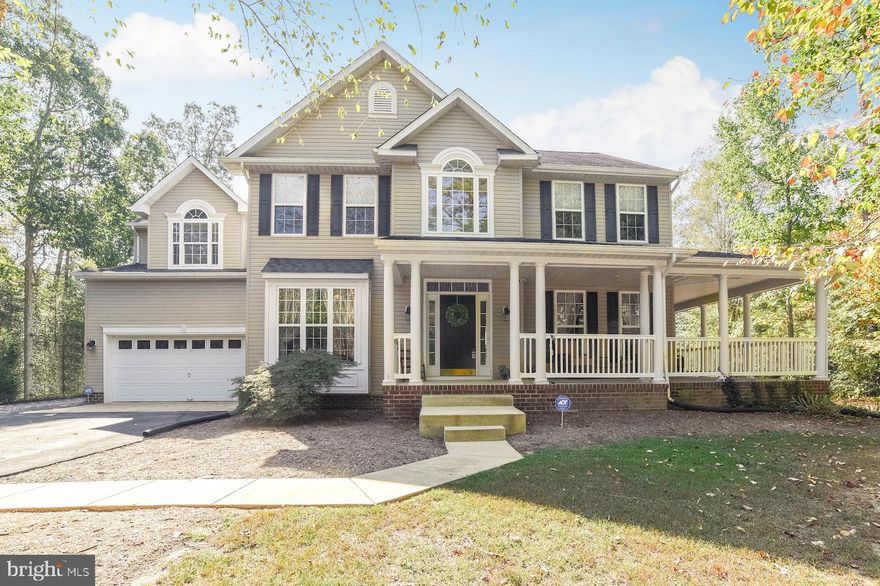 Come on out and fall in love!   This home has lots of space with great upgrades throughout.  The entryway boasts a grand staircase with two ways to access.  There is a large office off the front entry foyer that is private with French doors.  The front and side of the house are girded with a wrap around porch that has two separate entrances.  Curl up by the fire and enjoy heat and ambiance from the propane gas log set.  Entertain with an open concept gourmet style kitchen with a large center island.  Access the spacious 2 car garage off of the kitchen.  The garage has built in shelving and a utility sink.  The house has a high capacity electrical panel with a Briggs and Stratton propane generator to help keep items on if the power fails.   The basement is a concrete slab with insulated walls ready to finish however you would like.  There is an additional area in the basement for a second laundry room.  The basement has a walk out stairs and it is pre plumbed (stubbed out) for bathroom.  The upstairs level has a great master bedroom with double walk in closets and a sitting area.  The master bathroom has a large walk in shower as well as a large soaking tub.   The three (3) secondary bedrooms are large enough for king/queen beds with nightstands.  There is a laundry room upstairs.