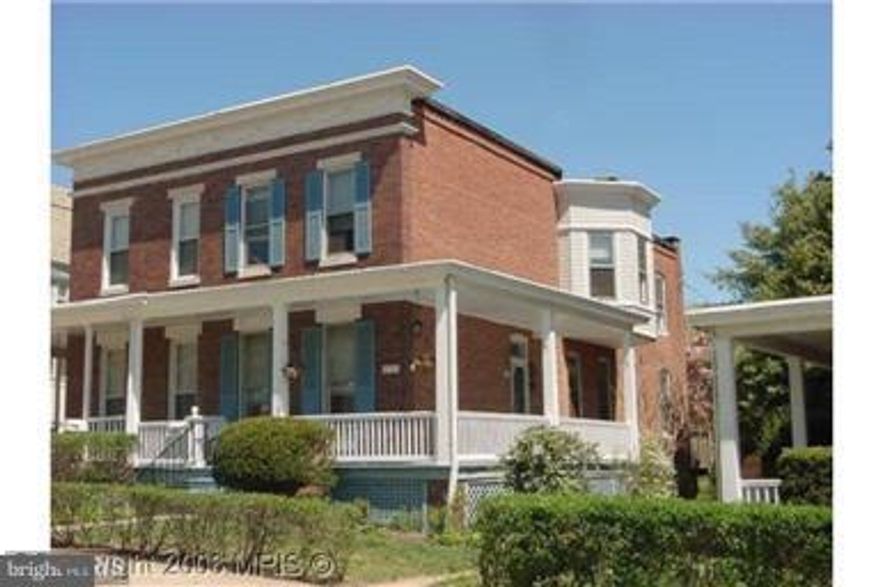 Brick Semi-Detached home loaded w/vintage "turn of Last Century" charming detail (Hardwood Floors, Bay Window, Lyncrusta Wallpaper and great Mouldings). High ceilings, spacious rooms. Large Eat-in Kitchen accessing Rear deck and private rear yard . Front Porch w/ wraps-around to side entry. Owner financing is available w /20% downpayment.