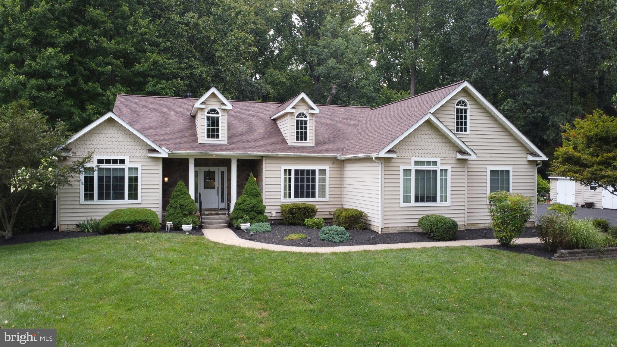 Where to begin...This is a Wonderful Custom Built Home with many, many upgrades! Sitting on a 2 Acre Lot with Majestic Trees and Beautiful Yard! Paver Walk Ways, Retaining Walls, Front Porch Entrance, Rear Porch and Beautiful Private Patio! Wonderful Foyer Entrance Begins a Truly Elegant Interior! Spacious Living Room Open to Gourmet Kitchen and Large Breakfast Nook! Cathedral Ceilings for a Truly Spacious Feeling! Formal Dining Room with Tray Ceiling! An Owner Suite of Luxury with a Truly Luxury Bathroom with Walk-in Glass Shower, Double Sinks and Huge Walk-in Closets! Gourmet Kitchen with Custom Floor, Cabinet and Ceiling Lighting! Many Areas of the house are wired for sound including back patio area! Custom Built-in Lighted Cabinets in Foyer and Front Bedroom! Patio is Gas Piped for Grill! Mudroom Entrance from Garage with Washer/Dryer, Powder Room and Kitchen Entrance! 2 Car Garage and Don't Miss the Office with Garage and Outside Entrance! Huge Shed Off Driveway! Really, to see it is to experience it!