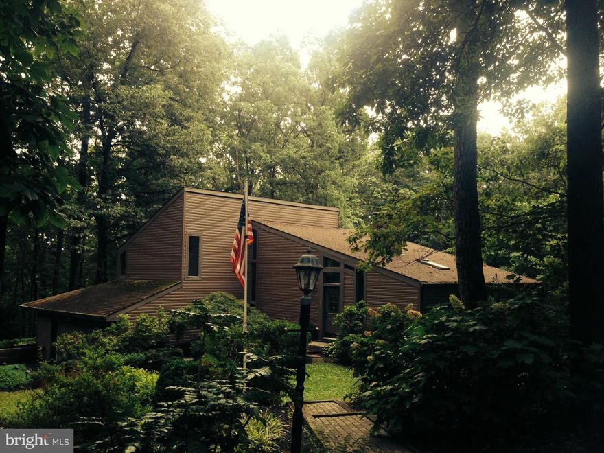 PRESTIGIOUS CONTEMPORY HOME + GUEST HOME...NESTLED ON ALMOST 10 ACRES IN FOREST PRESERVATION*AWESOME LOCATION IN HAMPSTEAD*IDEAL IN-LAW SUITE IN MAIN HOUSE*2 SIDED FIREPLACE IN LR & KITCHEN*GORGEOUS CABINETRY & SLIDER PANTRIES*ANDERSEN WINDOWS THRU-OUT*SECURITY SYSTEM*OWNERS SUITE W/SAUNA & BIDET*IN-GROUND ANTHONY POOL* LOADS OF NATURAL LIGHTING & VIEWS FROM BOTH HOMES*LOTS OF NATURE*EASY ACCESS*