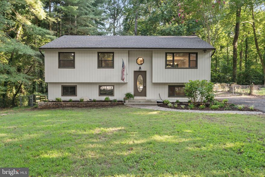 *****Offers will be reviewed Monday, 8/4 at 5:00 PM*****Saint Leonard-Beach Access Community!!! Enjoy the best of Southern Maryland living at an affordable price! This beautifully updated, move-in ready home is nestled in a Chesapeake Bay beach access community-just a short walk or drive to the water!  Enjoy fishing, swimming, fossil hunting, strolls on the beach and beautiful sunrises. Updates include Brand New Roof (30-year architectural shingle), New Carpet throughout, fresh paint-interior and exterior, Updated Kitchen and bathrooms, new interior doors, engineered hardwood floors, newly installed shrubs and more! Large level lot backing to woods for plenty of privacy and a spacious rear deck for grilling and outdoor entertaining.  Bring your Boat, RV, jet skis-there's lots of parking and even the possibility of adding a detached garage! Rare find in this community!