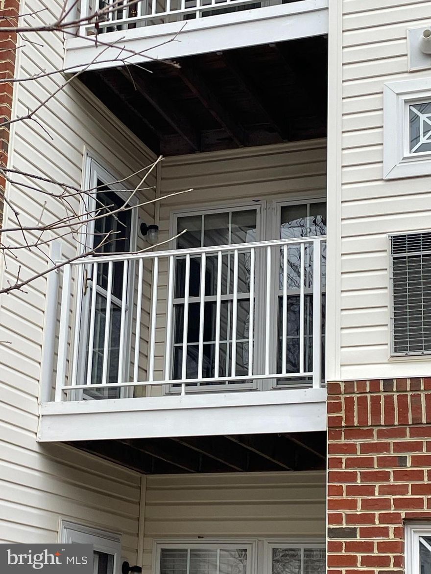 Nestled in the woods of White Marsh, this second floor two bedroom two full bathroom condominium in the quiet Silver Lake Community is just waiting for you.  The unit is on the second floor of a secure elevator building.  It has an open concept. The living and dining area are bathed in natural light from oversized  windows, that provide a versatile space for both relaxation and entertainment. Enjoy your morning coffee or evening wine on a private balcony.  Silver Lake is minutes from the Whitemarsh shopping district and Honeygo  Run Regional Park which features nature trails, a dog park, paved walking paths and outdoor pickle ball courts. It also has easy access to Interstate 95. The owner's are providing a $10,000.00 buyer's credit that can be used to replace the worn carpet, outdated paint color and other minor repairs. You can bring your own style and taste to your new home. Or use for closing costs.