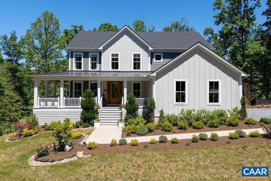 Magazine-worthy modern farmhouse built in 2022 by Evergreen Builders & further enhanced w/ exquisite bluestone terraces, curated landscaping, whole-house generator & fabulous finished basement. Set on 5.5 private acres, the property features sweeping 360-degree pastoral & wooded views, private walking trails & scenic frontage along Dollins Creek. Designed w/ a refined, luxury aesthetic, the home showcases soaring 18' coffered ceilings in the living room, where dramatic windows frame breathtaking sunsets & fill the interiors w/ natural light. The showpiece kitchen includes a waterfall quartz island, 48-inch Sub-Zero refrigerator, Wolf six-burner gas range, 2 Bosch dishwashers & a scullery-style pantry w/ additional prep space, storage & Wolf speed oven/microwave. Wide-plank white oak floors, 9' ceilings & double-sided gas fireplace shared between the living room & rear porch create a warm, refined atmosphere, while deep wraparound porches enhance the home?s natural indoor-outdoor flow. Enjoy the serenity of country living just 10 mins from acclaimed schools, wineries, shopping & dining.,Painted Cabinets,Quartz Counter,Wood Cabinets,Exterior Fireplace,Fireplace in Living Room