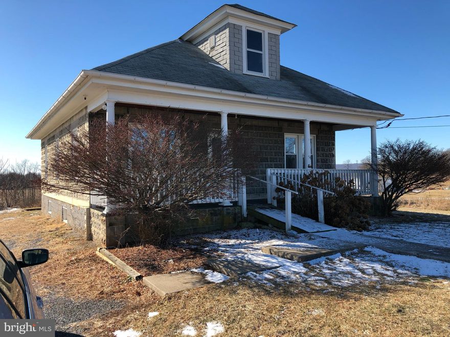 Cozy and comfortable country bungalow.  Built around 1926, this charmer features 2 bedrooms, 1 bath, spacious living room, dining area and kitchen. Wood floors in the bedrooms and living/dining rooms. This home is situated on a 1 acre lot.