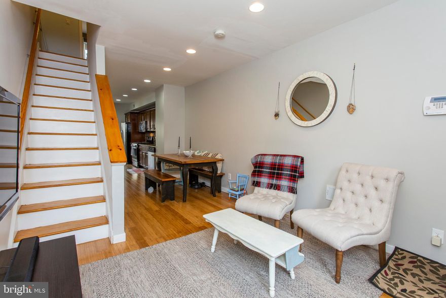 A beautiful home you need to see! Completely rehabbed in 2014, this lovely property includes desirable details throughout, including hardwood flooring, high ceilings, recessed lighting and large windows for ample natural light. The open living and dining room floor plan lead naturally into the lovely modern kitchen, complete with granite counters, tiled backsplash and stainless steel appliances. The kitchen also includes a sliding glass door that leads to a private concrete patio- just the spot for BBQ's on those sunny, warm afternoons! Upstairs, the second floor reveals two spacious bedrooms with ample closet space, conveniently located laundry and a lovely tiled hall bath with custom tiled tub & shower. Be sure to take a trip up to the third floor and feast your eyes on the massive master suite, complete with vaulted ceilings and a master bath with tiled flooring, dual vanity and beautifully tiled shower with custom alcove and glass enclosure. For those who still need a little extra storage space, the unfinished basement is ready and waiting to accommodate your storage needs! Found in the heart of East Kensington, this home is close to a variety of bars, eateries, parks, public transit and more! Don't wait, see this home today! Please check OPA for 2019 taxes due to possible citywide reassessment.