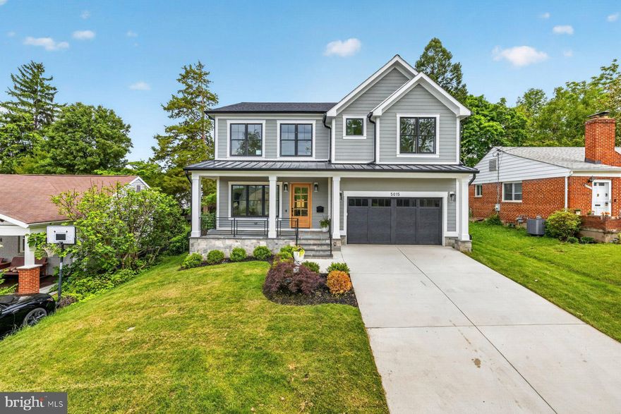 OPEN HOUSE 12-3pm 5/31  Sunday. Welcome to this exceptional newly constructed Craftsman-style residence in the highly sought-after Garrett Park Estates neighborhood of Kensington. Perfectly situated on a quiet street, this stunning home blends timeless architectural charm with sophisticated modern living. A welcoming covered front porch and elegant flagstone walkway create a warm first impression, leading into approximately 4,676 square feet of beautifully designed living space across three finished levels. White oak hardwood floors and expansive Andersen windows fill the home with natural light, enhancing the bright and airy atmosphere throughout. The main level is thoughtfully designed for both everyday living and entertaining, featuring a formal dining area and a spectacular gourmet kitchen complete with quartz countertops, stainless steel appliances, custom wood cabinetry, and a large center island with designer pendant lighting. The kitchen opens seamlessly into the spacious family room, creating the perfect gathering space. A functional mudroom with custom built-ins and cubbies provides convenient access to the attached garage. Upstairs, the luxurious primary suite serves as a private retreat with tray ceilings, a spacious walk-in closet, and a spa-inspired bathroom featuring a freestanding soaking tub, dual vanities, and a large walk-in shower with both rain and wall-mounted shower heads. Three additional bedrooms complete the upper level, including one ensuite bedroom and two bedrooms connected by a Jack-and-Jill bath. A conveniently located upper-level laundry room adds everyday ease. The fully finished lower level offers incredible versatility with a spacious recreation room, stylish wet bar, media or game area, exercise room or office, and an additional guest bedroom with a full bath. The walk-up basement opens to a covered flagstone patio overlooking the fully fenced private backyard, perfect for relaxing or entertaining outdoors.