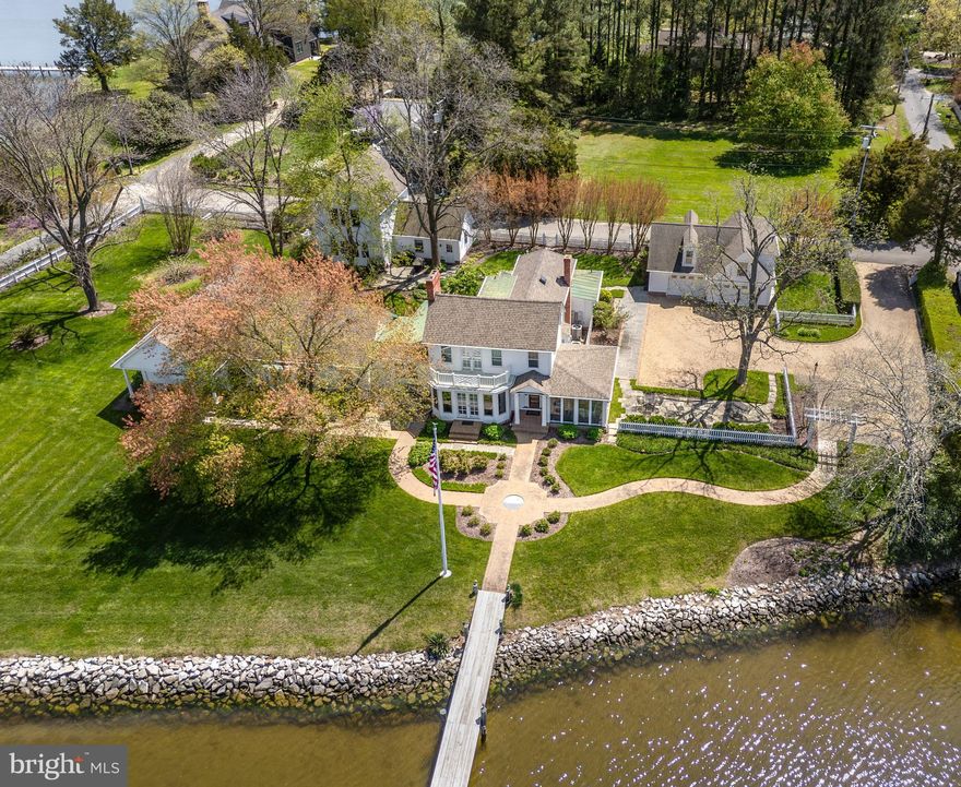 One of the most unique properties on Maryland’s Eastern Shore, ‘Swan Pointe’ offers the most commanding broad view of Oxford’s vibrant harbor on Town Creek. The property includes the main house and three garage bays in two accessory buildings, all situated on approximately one acre with beautiful landscaping, broad lawns, patios and porches, and mature shade trees, all on city water and sewer. A total of six full and two half baths among the three buildings. Ample off street parking and plenty of room for expansion make this property as unique as the town of Oxford where it is located.