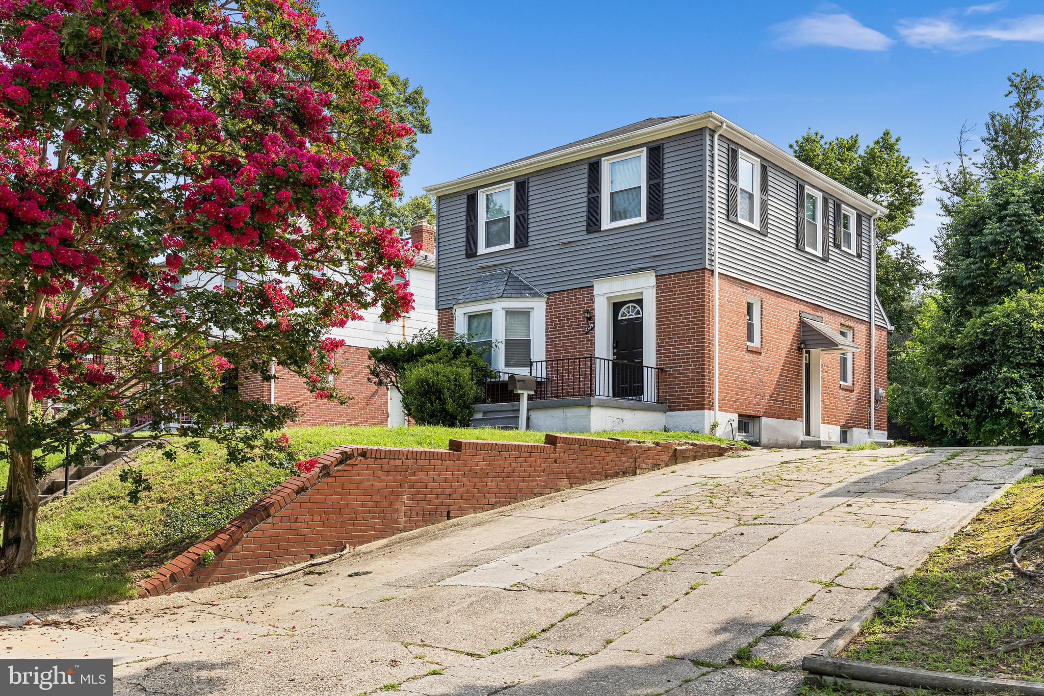 This beautifully renovated 3-bedroom, 2-bath Colonial offers timeless charm with modern updates. Nestled in a picturesque location facing the green space of Herring Run Park, this 2023-renovated home features a bright, updated kitchen with white cabinets, quartz countertops, and stainless-steel appliances. Upstairs you'll find three spacious bedrooms and a full bath, while the finished basement includes another full bath and a large bonus room—perfect for an office, den, or guest suite. Enjoy outdoor living in the large, level yard with a patio, plus convenient driveway parking. A rare find in sought-after Lauraville Historic District.