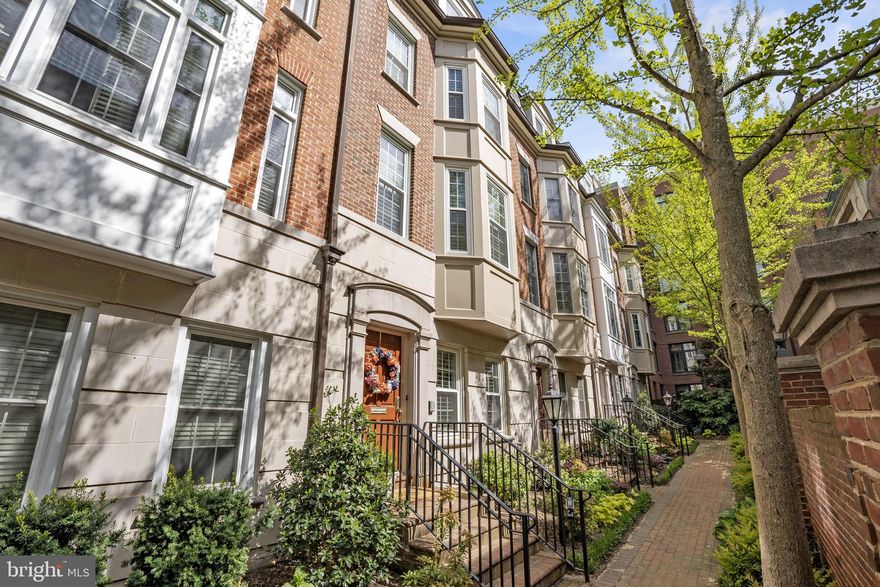 Open Houses Cancelled.
Major Price Reduction.  Incredible value for this rarely available, contemporary townhome in downtown Bethesda. Walk to everything. Three bedrooms, each with en-suite bathrooms, plus a den, two powder rooms, and a two-car garage. The primary suite features an oversized en-suite bathroom with a tub, separate shower, separate toilet room, and a walk-in closet. 

Details include ten-foot ceilings on the main level, hardwood floors, plantation shutters, crown moldings, and built-in bookshelves.  Laundry is conveniently located on the bedroom level and there are many additional linen and storage closets throughout the home. The spacious, open kitchen features an island and access to the outdoor patio.

This townhouse condo enjoys a quiet setting on a less-traveled street, yet so close to the action. Walk to the Metro station, shops, dining, groceries, and fitness studios.  Everything is steps away. Don't miss out on this exceptional residence!