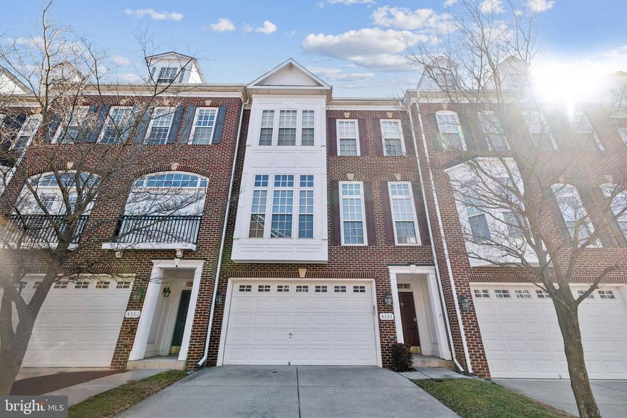 Open & Bright  all brick lovely 2 car garage town home in  Fairfax Gateway .Excellent condition ! Oak View ES, Frost MS, & Woodson HS school pyramid.  3 Bedroom, 3 1/2 Baths, with over 2600 sq ft of Living Space, The main and upper level with gleaming hardwood floors and floor-to-ceiling windows which provide lots of natural sunlight.  the large kitchen is extended with the adjoining family room and fireplace.  The eat-in-kitchen space with a sliding glass door to the Trex  deck. The home office could be your 4th bedroom.
  The upper-level primary suite with an updated bathroom and a new glass-enclosed shower. Two additional large bedrooms, a renovated hall bathroom and the convenience of the laundry room w/ cabinet space to complete the upper level. The walk-out lower level  has a family room with full bath. Minutes to  downtown Fairfax City. Dine at any number of restaurants, ride the CUE Bus to the Vienna Metro station or around town! You will enjoy the  weekend events that are enjoyable for all ages.