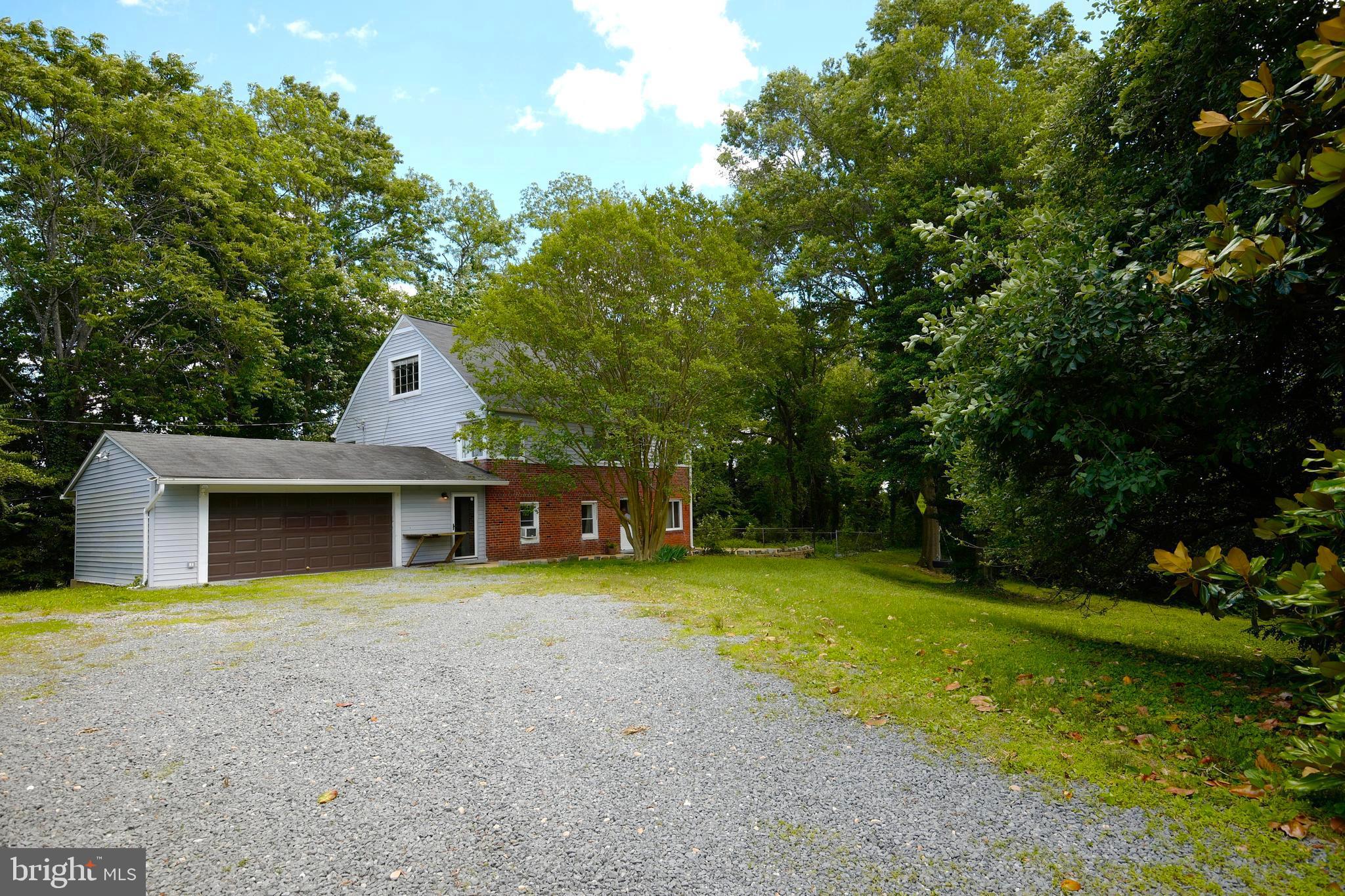 A house with 1.8 acres on a dead end street is for sale in this offering. The acreage includes four lots: #7025, #7027, #7029 and #7031. The properties are sited on a Ridge overlooking Huntley Meadows Park. The house and garage are located on 7025 & 7027 property addresses. The wooded buffer lots are 7029 and 7031. The existing house is properly sited on the lovely lots. The attic is large and could be converted to a living area. The attached garage is large enough for three bays. An in ground swimming pool exists and has been filled with earth.
The seller's expressed interest is for the properties to be maintained as a single residence. This stunning property is for Buyers looking for secluded land on a ridge with a wooded buffer, away from car traffic and wanting to renovate a house with a lot of promise.