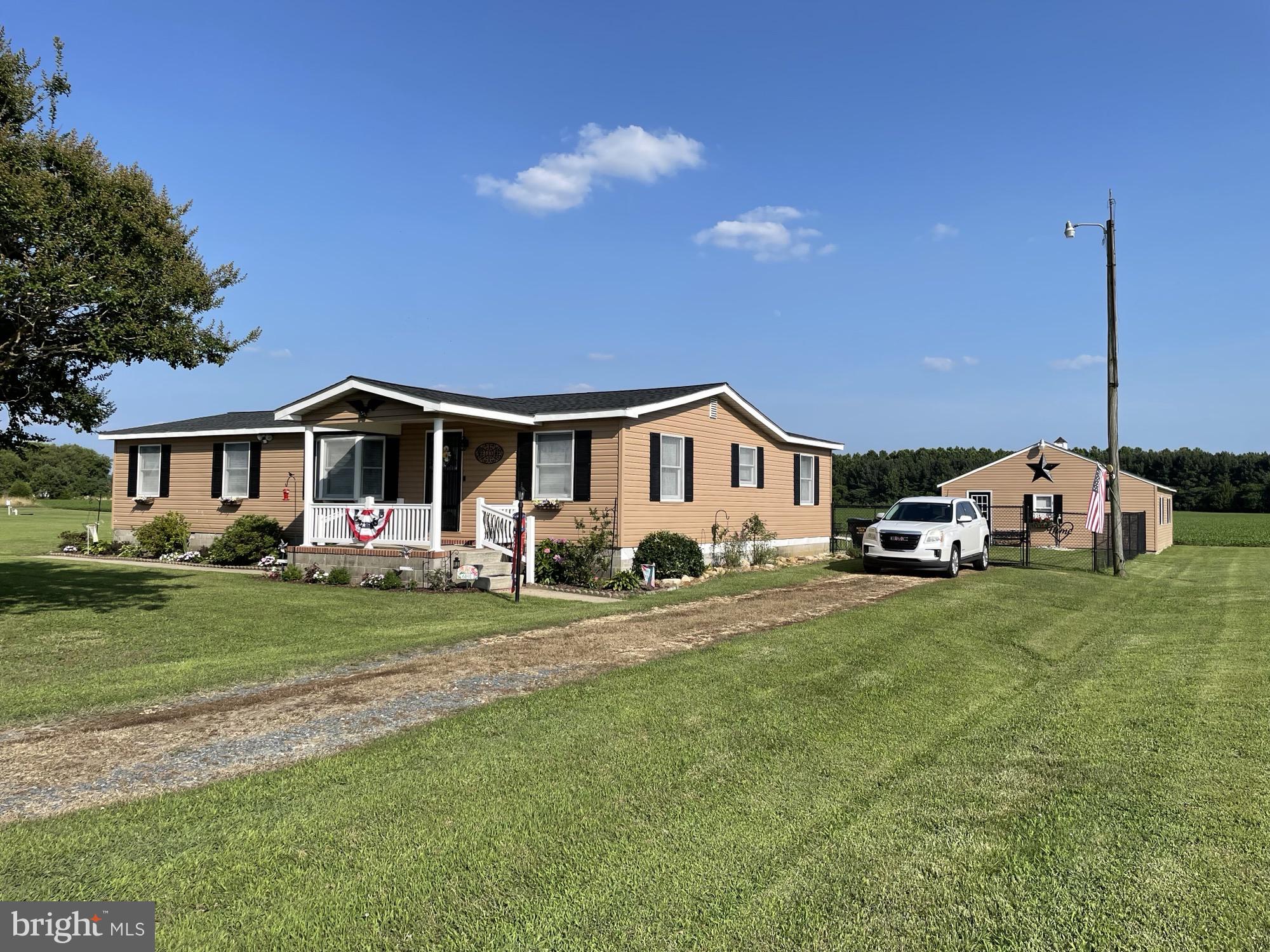 Charming 3-bedroom, 1-bathroom home on 1.3 acres with room to grow! This well-maintained, one-family-owned property features recent upgrades throughout, including a new roof (2024), hot water heater (2023), new appliances and countertops (2024), fresh paint (2024), new fencing (2024), and a brand-new septic system. The oversized 2-car garage offers ample storage or workspace. The primary bedroom includes an attached bonus room, perfect for a future second full bathroom. Zoned Village Commercial, this property offers flexibility for residential or potential business use. A rare find with both comfort and opportunity!