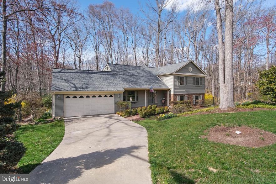 This professionally managed, generously sized four-bedroom home in Lake Ridge offers a tranquil living experience. A welcoming hardwood foyer leads to formal living and dining areas, while an eat-in kitchen provides a comfortable gathering space. A bright den with a fireplace adds warmth, and three bedrooms, including an en suite, are located on the mid-level. The top level features a private primary suite with a full bath, double closets, and ample storage. The property's charm extends outdoors, with a quiet cul-de-sac location backing to mature woods, providing a peaceful natural backdrop. A screened-in back porch offers sublime serenity, and a convenient oversized two-car garage completes this inviting home.-------------------------------------------------------------------------------------------------------------------------------------------- All Richey Property Management residents must enroll in and purchase a Resident Benefits Package which includes liability insurance, credit building to help boost the resident’s credit score with timely rent payments, up to $1M Identity Theft Protection, HVAC air filter delivery (for applicable properties), move-in concierge service making utility connection and home service setup a breeze during your move-in, our best-in-class resident rewards program, and much more! More details and options provided upon application.