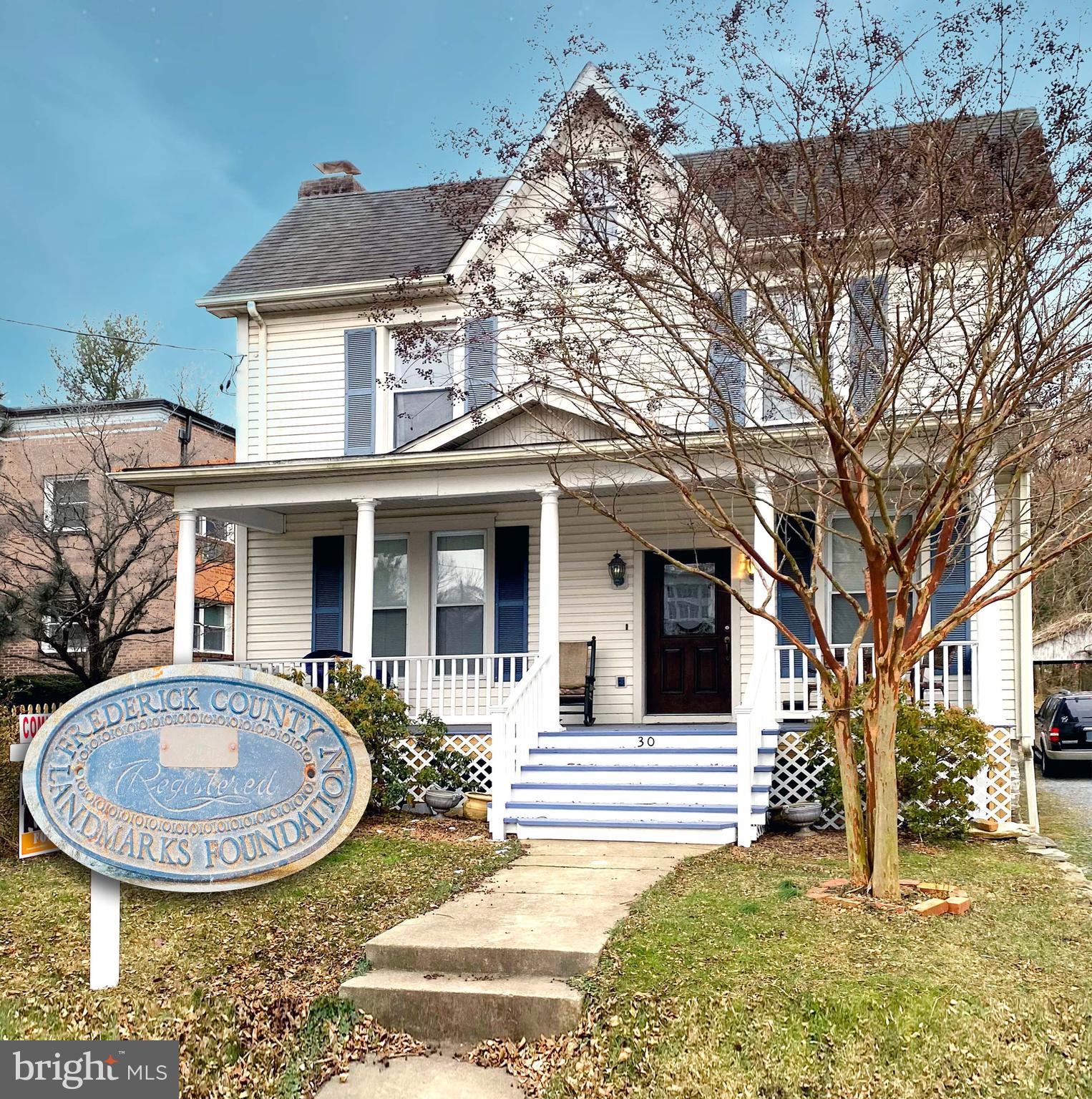 ** *Under Contract, will consider Back UP Contracts. Current Settlement date Feb 28**
Historic Middletown charmer, with lots of history and countless possibilities. Original log structure built in 1868 served as the first Catholic Church in Middletown, then later served as the first Middletown High School. The building was later added onto and turned into a residential property, but retains its historic roots. Original hardwood flooring throughout with high 10' ceilings, crown molding, a stone fireplace, and a first floor bedroom/den/office with brand new luxury en-suite bathroom on the main level. Great room is king sized and spacious with lots of natural light, country kitchen features granite counter, new LVP flooring, space for an eat-in kitchen, a large walk in pantry and adjacent laundry room and convenient mudroom. The welcoming foyer leads upstairs to four additional bedrooms... the primary front bedroom boasts 3 closets and an adjoining nursery/dressing room. A large bonus/sun room spans the back of the building. Three more generous sized bedrooms complete the sleeping accommodations. A full size bathroom and access to the floored attic above can also be found here. The driveway leads you through the vintage wooden garage to ample additional rear parking and a large yard with vibrant sunset mountain views. The wide southern front porch welcomes you and let's you enjoy the many small-town events like the Middletown Heritage Day festival and Halloween parade right from your front door. Middletown Award Winning Blue Ribbon Schools all within walking distance of your front yard, along with access to all of downtown Middletown's restaurant, shops, salons, and more just a short stroll away.
Property is zoned R-2 which potentially allows for many professional possibilities as well.. Bed and Breakfast, Beauty Salon, Professional Offices to multi-family dwellings. (Confirm with zoning office)
This property is in the National Registrar of Historic Places. Own a piece of history and create your future in this rare find.
Major updates and renovations recently done... brand new master bath on first floor with tile shower and sliding glass doors, new sliding barn doors lead to freshly painted main floor bedroom. Renovated kitchen with new LVP flooring in kitchen and pantry, freshly painted kitchen walls, ceiling, and cabinets, new tile accent wall behind stove, new built in microwave and cabinet. Upstairs front bedroom and sitting area freshly painted and a new closet was added to back bedroom. The basement has been waterproofed with french drain, sump pump and warranty, Porch rebuilt and painted. and a beautiful brand new picket fence allows for an enclosed side yard and partially enclosed backyard. New hot water heater, Nest thermostat and installed utility sink round out the improvements.
More Pictures Coming Soon!
Disclosure - Agent-Owned Property