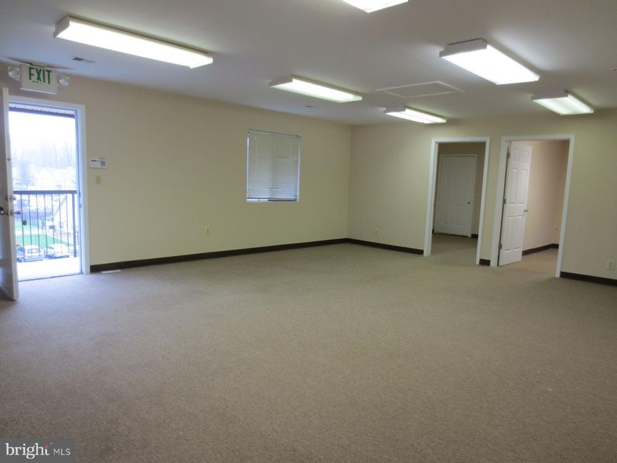 Top floor of 3 floors-Two large offices, large bullpen/open area. Lots of windows.  Currently being painted and carpet being professionally cleaned. Plenty of parking, unassigned.  One elevator and 3 staircases.  Can be purchased as one of 6 units as a portfolio. Tenant Occupied - sale is subject to lease.