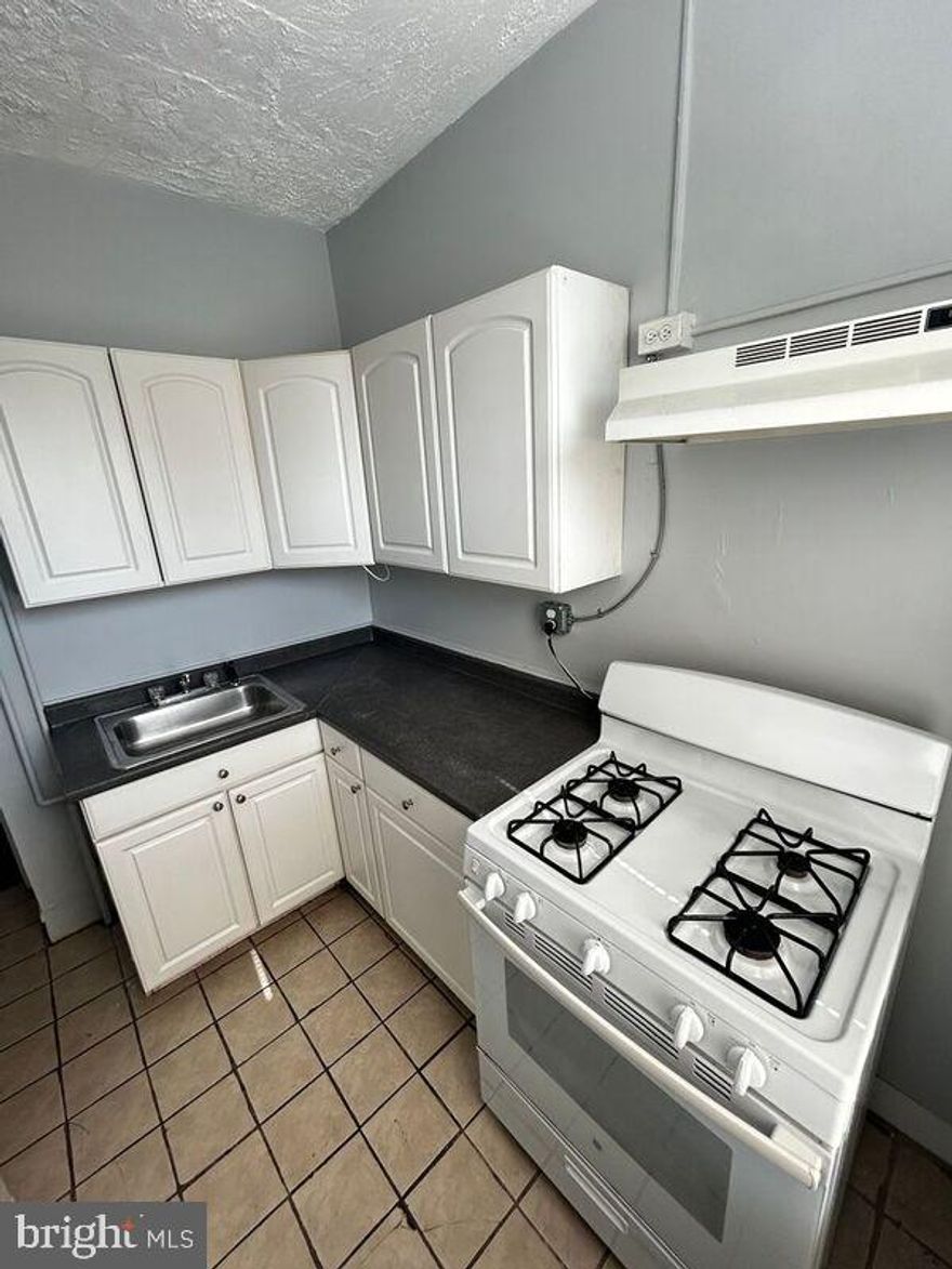 Spacious and charming 2-bedroom, 1-bathroom apartment with hardwood floors and overhead lighting throughout. This historic building boasts beautiful hardwood floors and stunning architecture, giving you a unique living experience. Kitchen with updated cabinetry and pantry closet. Updated bathroom with tile and updated vanity. Ample closet space! Elevator! Secure keyless entry into the building. Amazon Hub for package deliveries! Lots of comfort amenities to make this place your home! Utilities not included in rent. Available now!

Pet policy: Cats/Small dogs okay. Breed restrictions. $200 nonrefundable pet fee per pet. $35/month pet rent per pet

Application Requirements and Fee: $45 application fee. This property is not available for tenants with large dogs, more than 2 pets, an income less than 3.5x rent, a bankruptcy less than 10 years old, a judgment less than 7 years old, an eviction, or any unmet property requirements.

Hampton Court Apartments is a conveniently located mid-rise building in the Bolton Hill area of Midtown Baltimore City. Our professionally managed community offers a perfect mix of historic charm, affordability, and proximity to a variety of city amenities. It's within walking distance of MICA, University of Baltimore, University of Maryland Medical Center, State Center, Mount Vernon, Penn Station, the Cultural Center light rail stop, the State Center Metro station, and several bus stops. You’ll enjoy hardwood floors, large windows, and high ceilings. Virtual tours are available. Students are welcome. Inquire today.