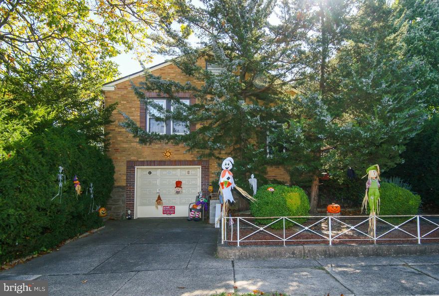 Open house today 10/19 from 10am-12pm!Fantastic opportunity to make this four-bedroom, two-and-a-half-bath single in the desirable Rhawnhurst section of Philadelphia your new home. Sitting on a HUGE corner lot, this beautifully built all-brick home has an oversized garage, a nice front porch, and a sunroom that’s perfect for those quiet coffee contemplation mornings.When you walk in, you’ll notice the stunning hardwood floors and the cozy living room with a working wood-burning fireplace. Just off the living room is your bonus room—or possible bedroom—making it convenient for first-floor living.Step into the kitchen and your eye will immediately catch the dramatic Tuscan-style archway, a detail you’ll see throughout the home. The kitchen has beautiful maple cabinets and a dining area that’s great for entertaining.Upstairs you’ll find an oversized main bedroom that’s bright and airy with plenty of closet space. On the same floor is a classic Northeast-style bathroom with a bathtub and stand-up shower combo, plus its own linen closet. On the third floor are two more generous bedrooms and another full bathroom with a soaking tub. I believe the square footage listed in public records is off—this home feels closer to 2,000+ square feet. The basement is semi-finished and currently set up with lots of storage space, plus a side hobby room and extra storage under the porch. This property really has it all—size, A/C, and solid brick construction that stands the test of time. Great location, HUGE YARD, close to transit and all major routes! Come this this home before it goes under contract!