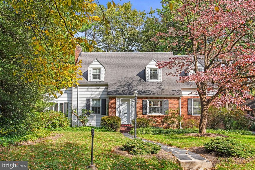 Classic 1940 brick beauty in sought-after Bellevue Park! This charming two-story home blends timeless character with thoughtful updates, featuring gorgeous hardwood floors, a cozy wood-burning fireplace, and custom-built-ins that anchor the main level. Entertain in the large formal dining room with stunning china storage, then unwind in the fully enclosed side sunroom. The remodeled kitchen and updated half bath make everyday living easy. Upstairs, you’ll find three spacious bedrooms and a beautifully renovated full bath featuring a jetted tub/shower combo and double-sink vanity. Need extra space? The finished lower level offers a flexible family/rec room. Outside, enjoy a private, tree-lined setting with a large deck overlooking the yard, plus a one-car garage and a handy garden shed for tools and mower. A rare blend of history, comfort, and convenience—welcome home to Bellevue Park!