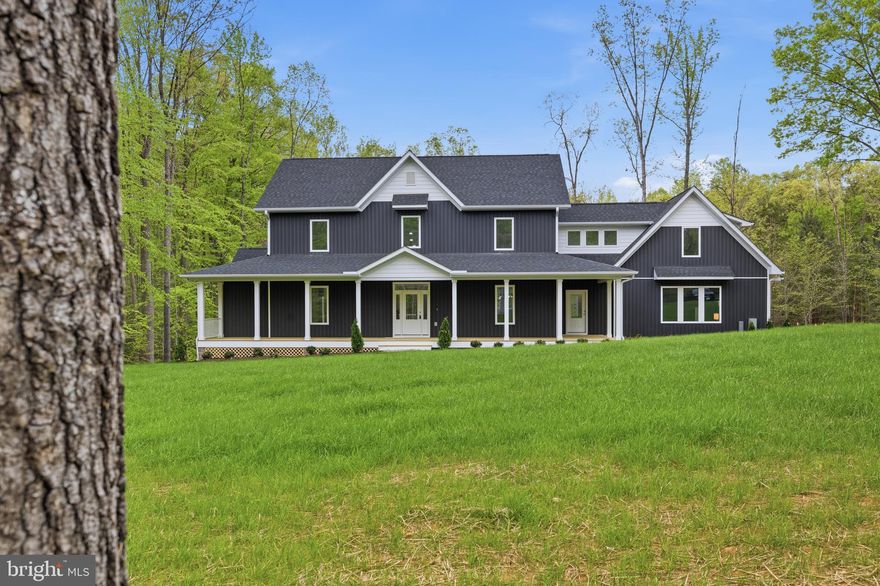 All “finished” photos are digitally generated based on the floor plan. Progress photos of the actual home will be added throughout construction. --- This stunning 5-bedroom, 3.5-bath farmhouse-style home seamlessly blends modern luxury with tranquil natural surroundings...AND it comes with your very own COVERED BOAT SLIP! The spacious main-level primary suite opens to a large deck overlooking a peaceful, wooded backyard and pond—an ideal retreat for morning coffee or evening relaxation. A conditioned walk-out basement offers a blank canvas to expand your living space, create the ultimate entertainment area, or customize to suit your lifestyle. --- This property is located in the highly desirable Noah’s Landing subdivision on the private side of Lake Anna, the home offers access to 28 acres of waterfront and an exceptional lineup of community amenities, including a private boat ramp, sandy beach, basketball, pickleball, and volleyball courts, and a covered picnic pavilion, with additional amenities planned. --- Firefly high-speed internet is currently being installed throughout the community, making this an ideal retreat for both full-time living and remote work. Don’t miss this opportunity to own a brand-new luxury home with instant equity in one of Lake Anna’s most sought-after and upscale waterfront communities.