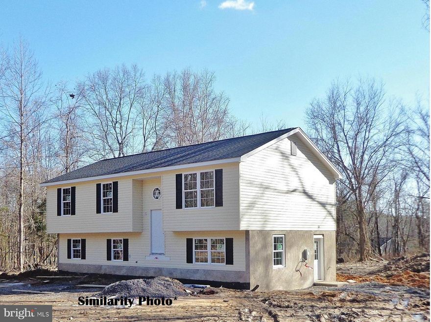 UNDER CONSTRUCTION! 3 Bedroom 2 Bath Split Foyer home on almost 2 acres!