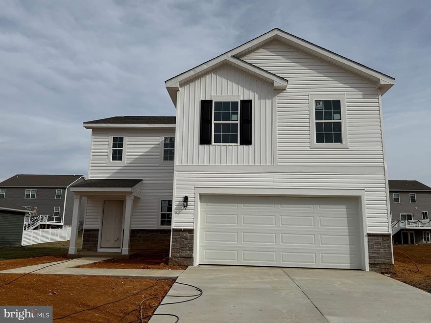 This Deerfield is a two story home with 4 bedrooms and 2.5 baths. The kitchen features a walk-in pantry and a large island with a double sink, which gives plenty of room for entertaining. Stainless steel appliances, 25 cu ft side by side refrigerator with in door water/ice, multi cycle dishwasher, disposal, range and microwave with Aristokraft kitchen cabinetry, LED work area kitchen lighting and granite countertops. America's "Smart Home Technology" featuring Quisys IQ HD touchscreen with camera Wi-Fi video doorbell, Echo Dot speaker with Alexa, Z-Wave programmable thermostat, smart light switch and Keyless Entry front door lock with deadbolt, flat screen prewires with cat-6 outlets in owners suite and living area, and finally a Wi-Fi enabled garage door opener. LVP flooring on main level, laundry and bathroom areas, wall to wall carpeting in bedrooms, and LVP on main level and bathrooms. ceiling fan pre-wires