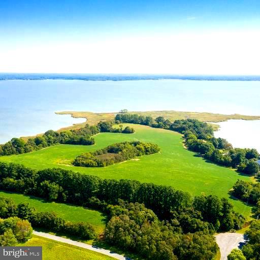 Chester Farm: 105 prime acres bordering Eastern Bay and Crab Alley, featuring two miles of shoreline. This unique opportunity of ten separate lots selling as one parcel allows the buyer to create their vision on one of the few remaining intact and undeveloped parcels of land this size. Chester Farm offers stunning water views in all directions and is an extraordinary habitat for wildlife. Property includes secluded shallow water cove and centrally located water impoundment. Property is currently in agricultural production and assessed accordingly. Acres could have many uses, including hunting or equestrian facility. Untouched wetlands and majestic trees provide a lush environment to enjoy your Eastern Shore lifestyle. Easy access to Washington, Philadelphia and major airports. Perfect for building your dream home, family compound or developing into a new subdivision, there are multiple opportunities to consider. Completed perc study and preliminary work with Queen Anne county planning, zoning and health department indicates potential development and subdivision of existing lots. SDA plan submitted to Queen Anne's County in May 2020 is included in listing.