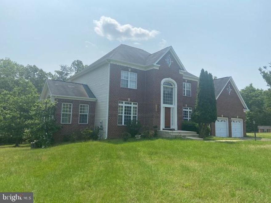 Large detached colonial, two car garage, basement, large 2 plus acre lot, large set back from the street, shared driveway.  Close to Washington, DC, Alexandria, Va and Waldorf for shopping.