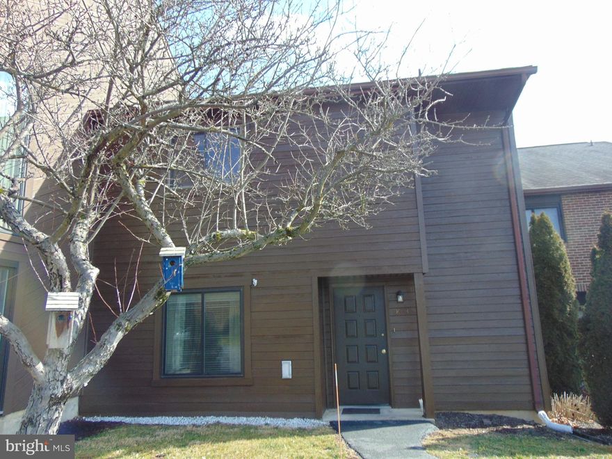 Move right into this spacious, freshly painted 3 bedroom, 2 1/2 bath Pinebrook townhouse.  Open living and dining rooms.  Family room off living room.  New laminate in living, dining and family rooms.  Tile kitchen with newer cabinets.  Powder and laundry room.  Second floor features a Master suite with master bath, walk in closet and private balcony.  2 additional bedrooms and a full bath complete the second floor.  Nice deck overlooking pool and pavilion area.  1 car detached garage (9C) as well as 1 assigned parking space.