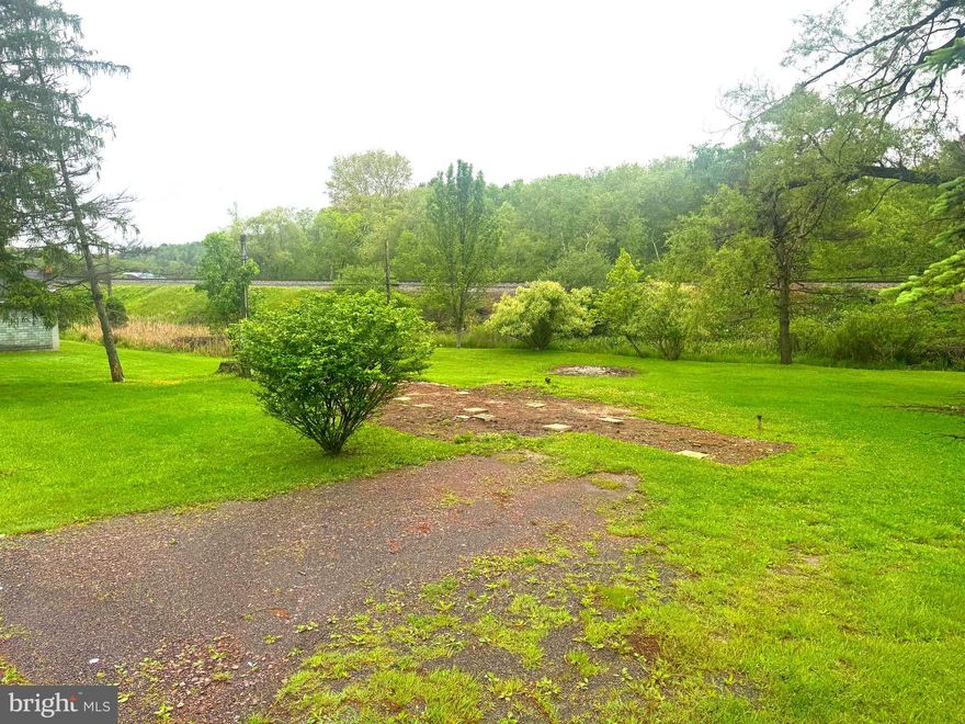 Lot within the town limits of Oakland with water and sewer hookups. This lot had a mobile home that was taken off. According to the owner, both Garrett County Planning and Zoning and the Town of Oakland have indicated that another mobile home can be placed on the lot. Buyer should verify with Garrett County Planning and Zoning and also the Town of Oakland. There is a two car detached garage on the lot. Property borders Town of Oakland Glades Park and Trail and directly across the street from the walking path at The Glades.  Convenient location close to all town activities.