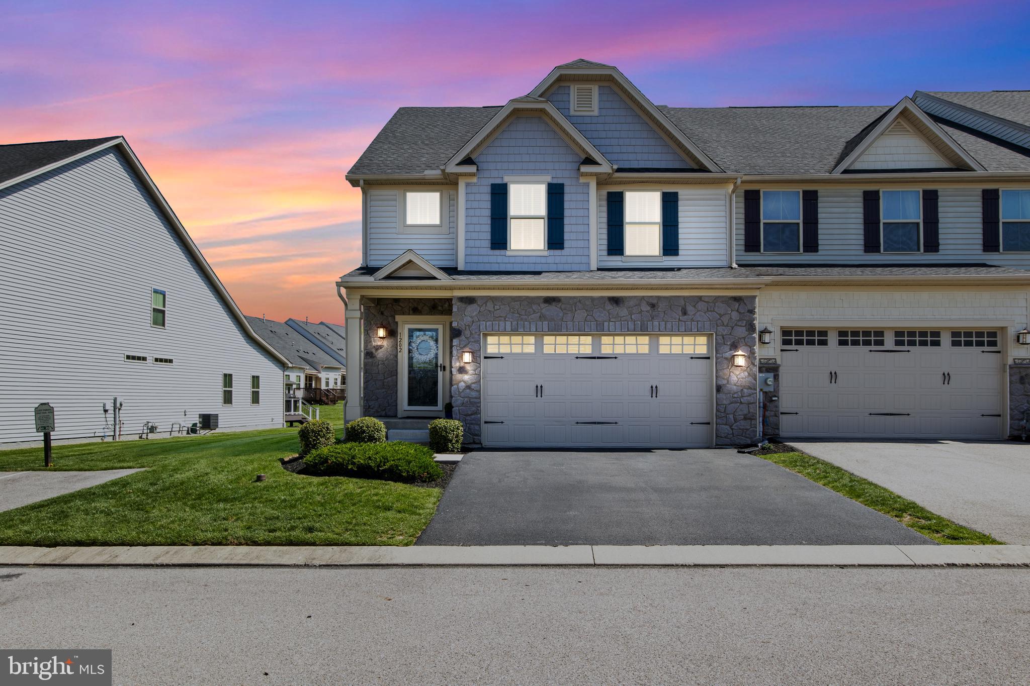Welcome to this spacious luxury villa at Regents Glen, with first-floor living at its best. Upon entering this beautifully maintained home you’ll immediately notice the extended open floor plan with high ceilings, large windows and hardwood and ceramic tile floors. This home includes many other upgrades to Ryan Homes’ popular Griffin Hall model.
The gourmet kitchen is a chef’s dream, complete with a 5-burner gas cooktop, double ovens, abundant cabinetry, and ample workspace. A peninsula-style counter offers seating for four, perfect for casual dining and entertaining. Adjacent to the kitchen, the dining area is elegantly finished with crown molding, chair rail and wainscoting, and includes a built-in glass-front china cabinet and granite top buffet credenza. This inviting space easily accommodates seating for up to eight, making it ideal for both intimate dinners and holiday gatherings. Conveniently located off the kitchen is a ceramic tile laundry room featuring built-in seating and storage cabinets, as well as a half bath for guests and access to the two car garage. The living room features a vaulted ceiling, a cozy gas fireplace, ceiling fan and access to a beautifully landscaped private concrete patio—perfect for outdoor entertaining.
The first-floor primary suite features hardwood flooring, tray ceiling, ceiling fan, spacious en-suite bathroom with walk-in shower with bench seat, ceramic tile floors, double vanity, granite counter, linen closet, separate toilet room and a spacious walk-in closet with ample storage.
Upper Level & Bonus Spaces Upstairs. The hardwood staircase with decorative iron railings lead you to a versatile loft overlooking the living room area with two spacious bedrooms, both with large walk-in closets, a double vanity bathroom with ceramic tile, linen closet and a bonus room currently being used as an office, but the possibilities are endless.
Basement & Outdoor Living. The full basement includes poured concrete walls, a bathroom rough-in, and a large egress window, offering excellent potential for future finishing or customized expansion. Outside, the private concrete patio offers a perfect space for entertaining or enjoying a peaceful evening at home.
The Regents Glen community provides a beautiful surrounding with lush, well-maintained landscaping, natural beauty, access to the rail trail for walking and biking, and offers optional membership to Regents’ Glen Country Club, which has an 18-hole golf course, dining at The Fairway Table, swimming pool complex, fitness center, bocce courts and pickleball courts.
Minutes from I-83, York Hospital.