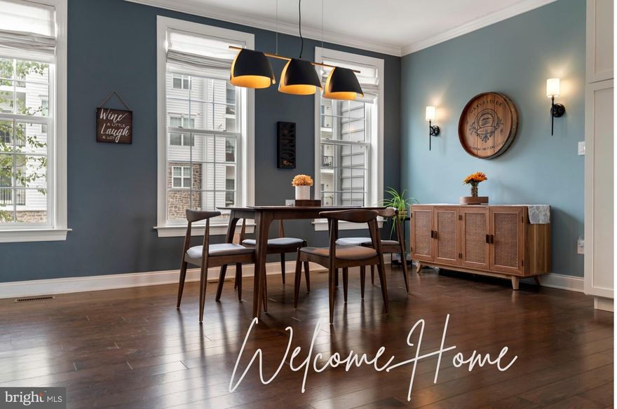 Welcome to Ravenscliff living at its finest! This beautifully appointed 2017 carriage house–style townhouse offers the perfect balance of comfort, function, and style. Nestled in the sought-after Ravenscliff community, this home blends modern design with inviting warmth, making it an ideal retreat.

Step inside to discover a thoughtfully designed interior featuring 9’ ceilings, recessed lighting, and gorgeous engineered hardwood floors that flow through the main living spaces. From the garage entry, the lower level greets you with a spacious family room complete with a built-in office, and a full bathroom with heated floor which make it perfect as a private guest suite, quiet retreat, or productive workspace.

On the second level, the open-concept layout shines with a chef’s kitchen boasting stainless steel appliances, a farmhouse sink, and a large island with seating for four. Built-ins enhance both storage and style, while the kitchen flows seamlessly into the dining and living area. Gather by the cozy gas fireplace or step out onto the composite deck to enjoy hillside views and grilling. A convenient half bath completes this level.

Upstairs, all three carpeted bedrooms are thoughtfully situated on the same floor as the laundry area. Double doors lead to the vaulted primary suite, a true sanctuary with two large walk-in closets and a spa-like ensuite featuring a luxurious walk-in shower. Two additional bedrooms with generous closets and a full bathroom round out this level.

The unfinished walkout basement offers soaring ceilings and daylight windows, providing endless possibilities—whether you envision a media room, home gym, playroom, or additional guest space. Outside, the oversized attached garage is complemented by a two-toned brick driveway, providing ample parking for you and your guests.

Additional highlights include a newer water conditioning system for peace of mind. With the association covering lawn care, snow removal, and common area maintenance, you can spend more time enjoying your home and less time on upkeep.

Ravenscliff is more than just a neighborhood, it’s a vibrant community with easy access to parks, schools, and local conveniences. Don’t miss the chance to make this exceptional home your own. Schedule your showing today!