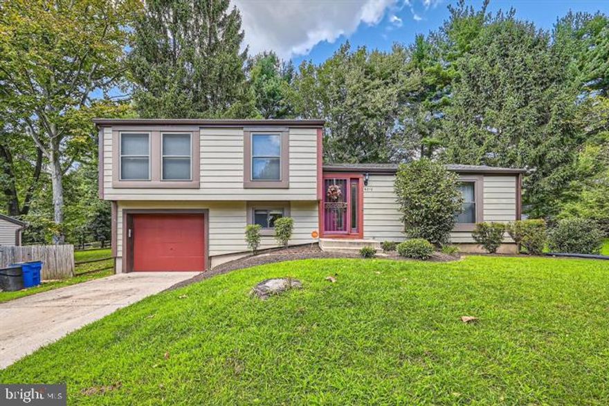 Charming, spacious split level home....lovingly renovated and maintained by the owners, with many great features! Updated kitchen has granite counters and stainless steel appliances. Inviting family room......large basement offers many possibilities. Sliding doors off dining room lead to beautiful deck and sizeable back yard, perfect for entertaining! Updated primary and hall bathrooms. Attached garage renovated in 2023, and door painted in 2024. HVAC new in 2021, water heater new in 2024, dryer new in 2024 and electric updated in 2024. Convenient to parks and stores! Owners have never used the fireplace, and would prefer that tenants not use it as well.