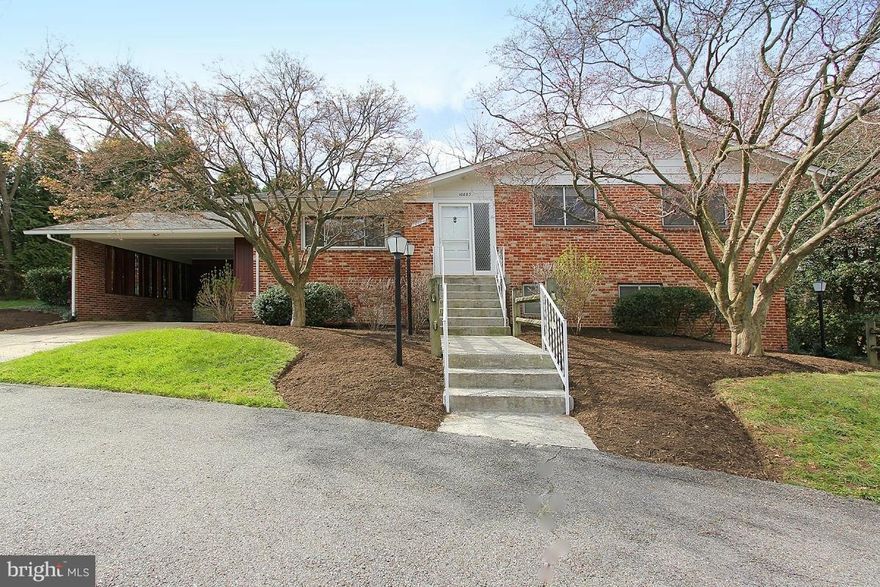 Amazing opportunity! Large, approx. 2,800 s.f home on TWO LOTS ( 25,181.s.f.) Perfect for home business or large/multi generation family. (SEE FLOOR PLAN)  4 BRs w/more on walk out LL previously used for doctor's home office. 2 full BA, 2 half BA, gorgeous wood floors,updated kitchen w/ new SS oven & micro, lots of custom built-ins,carport,large circular drive w/parking for10+cars. Ideal location!