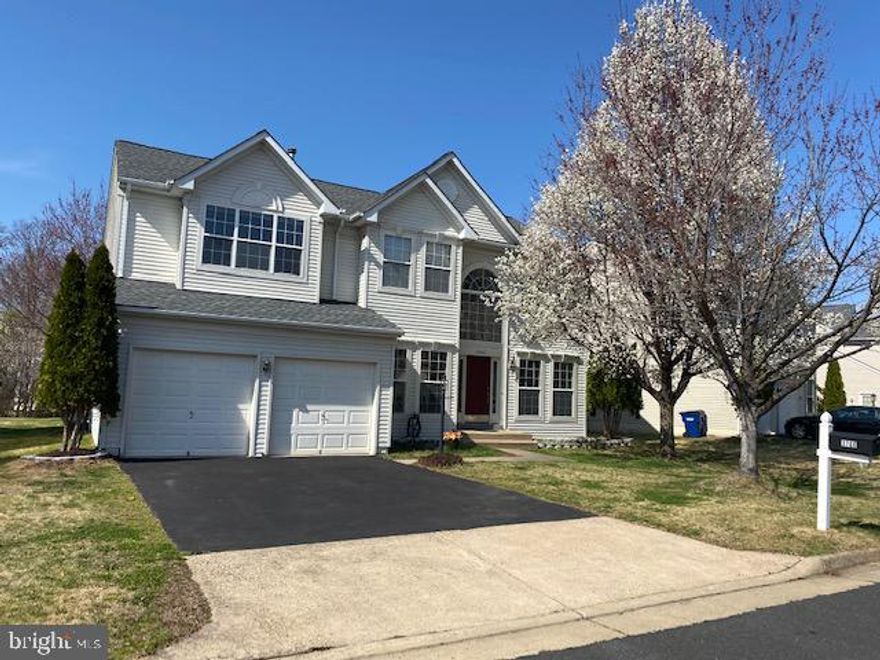 MINIMUM OF 2 YEAR LEASE. MOVE-IN READY! Newer carpeting and new paint on main level! Beautiful colonial home w/ 4BR, 2.5BA & 2 gar garage. Spacious bedrooms, sitting rm in MBR, kit island w/ breakfast area, office on main level & deck/patio in the backyard! Close to I-95, Rt.1, Quantico Base,restaurants,stores & shopping. Pets are on a case by case basis.