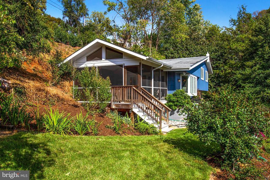 Welcome home to "April Hill," in the scenic and highly sought after water privileged community of Winchester on the Severn. This charming 4 bedroom, 3 bathroom home is nestled in a quiet nook that boasts SWEEPING WATER VIEWS from just about every corner of the house and a landscaped yard with blooms and ornamental trees that you will enjoy throughout the seasons. Walk in through the front door onto the entryway landing and you’ll get a peek into what this home has to offer — first floor rec room, main level gym (or bedroom) with full bath. A few steps up leads to an open kitchen and living room space complete with a large bay window and sitting nook- THE VIEWS!!!! As you head up to the kitchen and living area your eyes will quickly be drawn to the beautiful set of French doors that open up to a SPACIOUS screened in porch. This 16' x 16' space with Trex flooring, Azek beadboard ceiling, cedar trim, and nautical cable is so incredibly inviting and offers such BREATHTAKING VIEWS that you just might not want to leave! Use it as your own private oasis or share it with friends -- with its location off the living room and kitchen, it's an entertainer's dream!!! But wait, there's more! Take a stroll or hop in your golf cart for a quick trip to the community beach, located just a few hundred feet from your driveway. Enjoy sunsets and sunrises, launch a kayak, or let the kids play at the playground. The original owners were avid gardeners and established beautiful flowering spring trees and shrubs, so the home gained the name of "April Hill." The current owner has enjoyed improving the landscape and gardens to live up to its name, adding professionally installed landscaping in 2019 and 2020.  DO NOT HESITATE, this is a must see property in one of the best neighborhoods in Annapolis! DID WE MENTION THE VIEWS?!?!