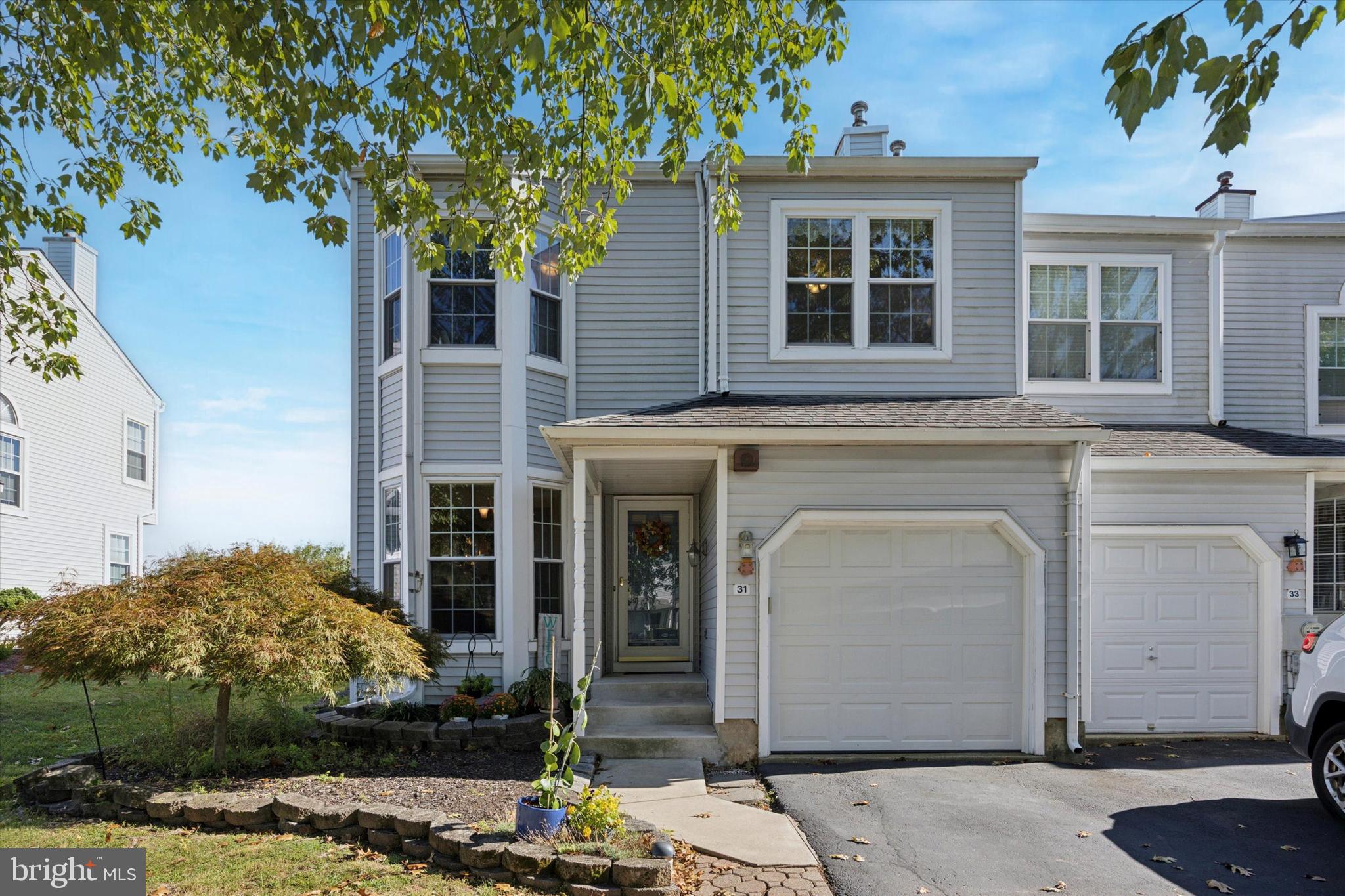 Drop the mic—this sun-filled end-unit townhouse in The Tyler Walk Community of Newtown, Bucks County, has the space and features you’ve been searching for. The galley kitchen showcases stainless steel appliances and a brand-new gas stove, blending style with function, and is complemented by a charming breakfast nook. Step out onto the composite rear deck and enjoy a private fenced backyard creating your own outdoor retreat for morning coffee, pets, or entertaining. The walkout finished basement adds valuable living space with the flexibility for a third bedroom, home office, or media room. Upstairs you’ll find two bedrooms and two and a half baths, plus the convenience of a one-car garage. Recent updates (2015) including roof, fence, and HVAC, make this home move-in ready. Just minutes from Newtown’s shops, dining, and award-winning Council Rock schools, 31 Skyview Way delivers the perfect blend of space, style, and location. Open House Weekend Event Saturday & Sunday 1pm -3pm.