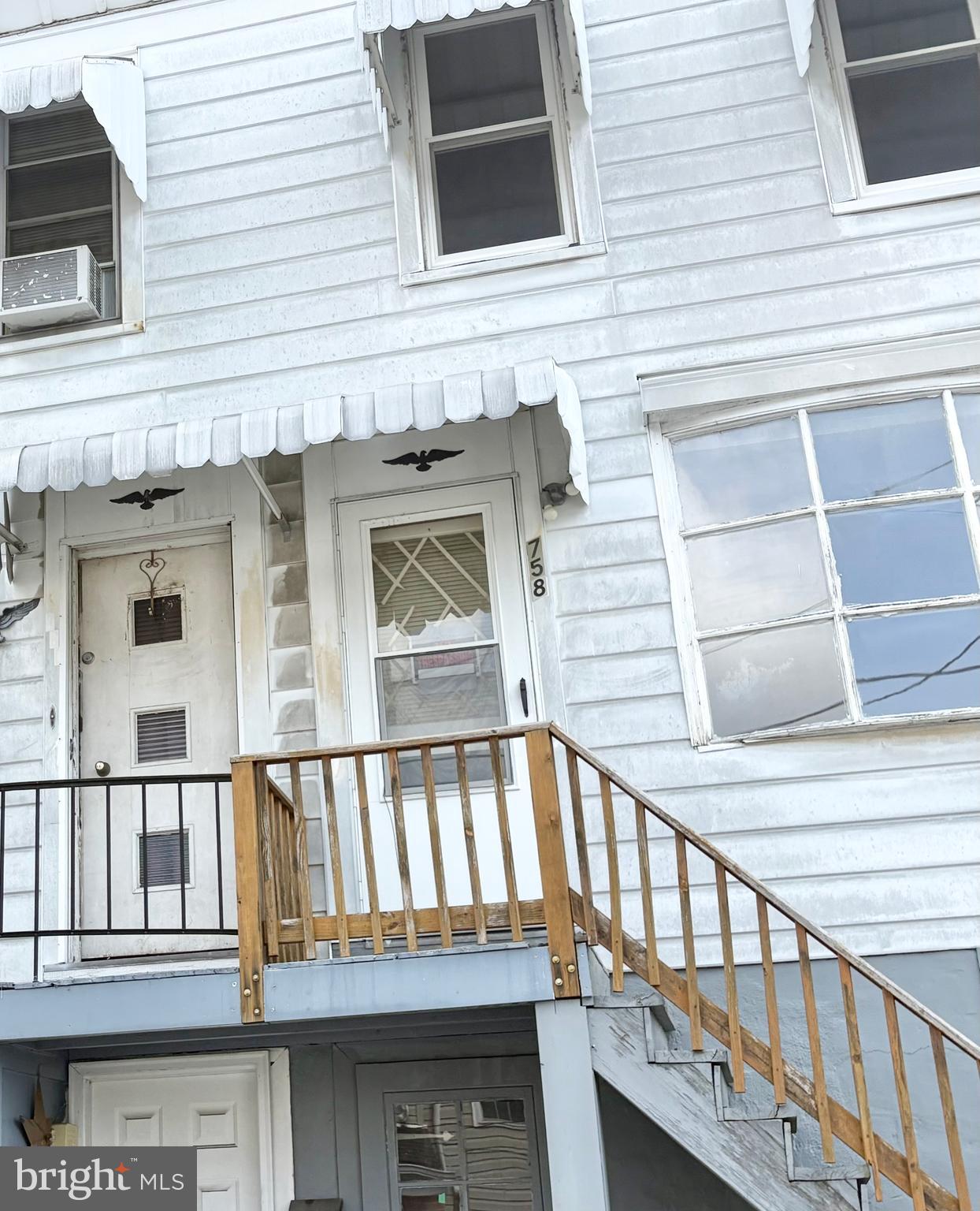 2 unit sold as-is. Could be converted back to single family. Interior stairs still intact.
Off street parking in rear.