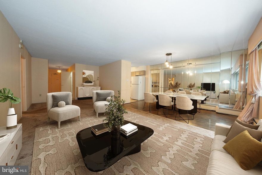 Beautifully updated 2 bedroom, 1 full bath unit is the Penn Center Building is ready for you to nove right in and enjoy everything Rittenhouse Square has to offer.  The spacious open-concept living and dining area is filled with natural light, creating a warm and inviting atmosphere. The updated kitchen features beautiful new cabinetry, quartz countertops, a subway tile backsplash, newer appliances, including a Bosch dishwasher and abundant workspace and storage. The sizeable primary bedroom offers a walk-in closet, while the second bedroom provides great flexibility for guests or a home office. The updated hall bathroom includes a tiled walk-in shower and modern finishes.  Additional storage and convenient in unit laundry complete this space.  Residents enjoy access to a beautiful rooftop deck, community room, and library. Penn Center House is a well-managed, owner-occupied building offering access control, front desk coverage, and on-site maintenance. This unbeatable location is close to Philadelphia’s world-class museums, restaurants, and entertainment — and within the highly rated Greenfield K-8 catchment. The monthly co-op fee covers all utilities, basic cable, and real estate taxes. Parking and gym membership are available for an additional fee. Financing options are available through First Trust and Cross Country Mortgage.