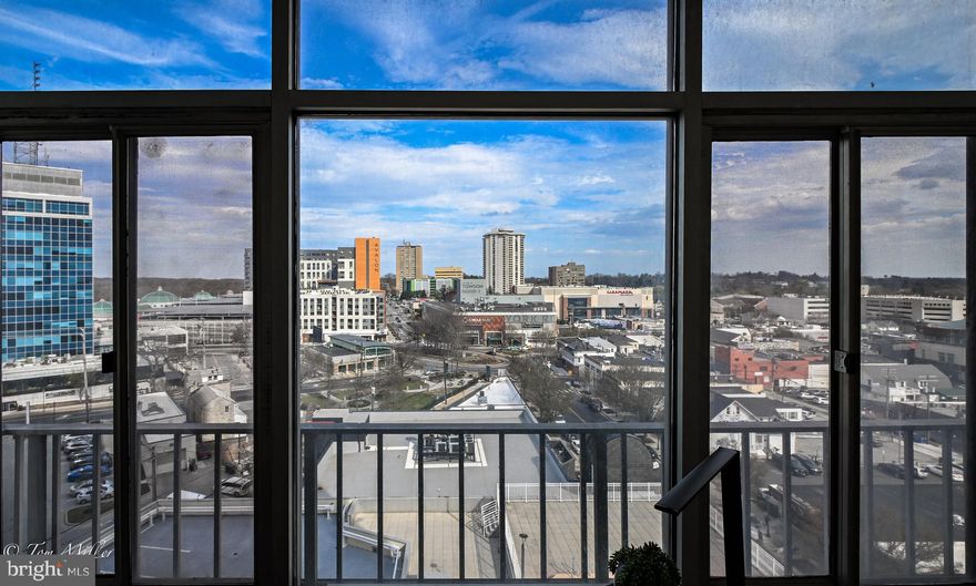 The COOL 1 Bed/1Bath CONDO located in THE PENTHOUSE on the 12th Floor with a Stunning Panoramic View of Downtown Towson and the Towson Circle and many UPDATES is not to be missed!  This Lovely 847 Square Foot Condo has the enclosed Deck, thus adding additional space of a Sunroom, which makes a Wonderful Home Office with more Amazing Views!  As you enter this Fabulous Condo with LVP Flooring Throughout, there 2 large Closets; one a Walk-in Closet great for storage, and Directly in front of you through the Open Kitchen, Living & Dining Room are the Floor-to-Ceiling Windows with that Incredible View! The Updated White Kitchen has Stainless Appliances, Granite Counters, and Counter Seating, The Barn Door Sliders off the Sunroom/Office into the Spacious Bedroom Creates an Intimate Private Space which also has a Large Closet, Off the Bedroom is a Bonus Dressing Room with another Spacious Closet, a Stackable Washer/Dryer Combo and Access to the Lovely Updated Full Bath. Recent Updates include: Herringbone Backsplash and Culligan Water Filtration in the Kitchen, Hunter Douglass Blinds, Guardian Security System, Natural Stone Backsplash in the Full Bathroom, NEW Shower Fixtures, NEW Stackable, Washer/Dryer Combo, NEW Closet Organizers, Expansion Tank Added to Water Heater. The Penthouse Amenities include a 24/7 Concierge, a Heated Outdoor Pool and Gym, along with a Game Room and Library. THIS UNIT IS NOT TO BE MISSED!! Schedule a Showing today!