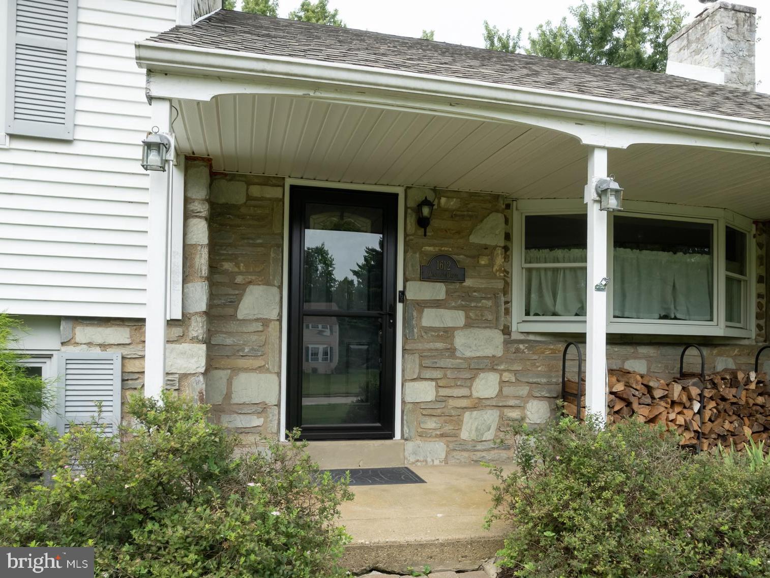 Welcome home!
This inviting four-bedroom, two-and-a-half-bath split-level home sits in an established neighborhood within Gwynedd Valley and the award-winning Wissahickon School District.
Designed for comfort and convenience, the residence features generous living spaces and abundant natural light. Each room is thoughtfully arranged for relaxation or entertaining. Gather with friends or enjoy quiet family evenings—the home’s harmonious flow and seamless access to outdoor areas make it ideal for every season.
Step inside from the quaint, covered porch, and you’ll find a formal living room filled with sunlight, highlighted by a bow window and a wood-burning stove insert. The adjacent stone fireplace is complemented by custom built-in shelving.
The formal dining room opens to a bright, airy three-season room through elegant glass French doors. This space is perfect for morning coffee or reading with tranquil backyard views. It features numerous windows, a vaulted ceiling, ceiling fans and skylights. A door leads directly to the backyard for easy indoor-outdoor living.
The home sits on over half an acre and boasts a spacious backyard enclosed by a tasteful privacy fence. A well-maintained shed provides ample space for gardening tools or lawn care equipment. The backyard oasis is perfect for summer barbecues and offers plenty of room for children and pets to play, while mature trees create a peaceful, shaded retreat.
The eat-in kitchen, located adjacent to the formal dining room, features abundant cabinetry and a butcher block island with ample storage beneath. A sunny window above the sink complete the space.
The lower level includes a large family room, a convenient half bath, and a laundry room with access to the one-car garage and a separate door to the driveway.
Upstairs, the primary bedroom offers a generous walk-in closet, ceiling fan and a private en-suite bathroom with a stall shower. Three additional bedrooms provide ample closet space, with ceiling fans and share a well-maintained full hall bath.
The fourth bedroom is a large, dormer-style space with plenty of storage, ideal for a home office, hobbies, or a home gym. A walk-up attic is accessed from this room, offering even more storage options.
Additional highlights include hardwood floors throughout most of the home, generous room sizes, and a peaceful setting for gardening, play, and entertaining.
Located near scenic parks, charming local shops, and popular restaurants, this home also offers quick access to regional rail stations and major routes (63, 309, and 202), making commuting effortless and connecting you to everything the area has to offer.