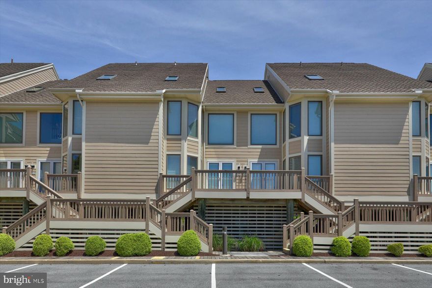 Welcome to your oceanfront coastal retreat! This fully furnished stunning property offers the epitome of coastal living with 4 bedrooms, 3.5 baths, and a complete renovation that brings light and brightness throughout. Step inside to discover gorgeous floors that lead you into a gourmet kitchen adorned with stainless steel appliances and exquisite corian countertops, perfect for culinary enthusiasts.
Entertain with ease in the spacious living area boasting large windows that flood the space with natural light, while a deck awaits outside, providing an ideal setting for grilling and enjoying the coastal breeze. 
Need a quiet place to work or an additional bedroom? The versatile office space can easily be converted to suit your needs.
Awaken to breathtaking ocean views from the primary en-suite, featuring a newly renovated-tiled shower, luxurious custom vanity, and a serene ambiance that invites relaxation. Three additional generously sized bedrooms and two more newly renovated tiled baths ensure ample space for family and guests.
Multiple decks beckon you to savor both sunrise and sunset, creating unforgettable moments against the backdrop of the sea. Beach storage and an outside shower add convenience to your coastal lifestyle. As part of the community, you'll have access to a bayfront pool, perfect for a refreshing dip on warm summer days. And for those who love to fish or simply enjoy the tranquility of the bay, a bayfront pier awaits your exploration. 

Indulge in the ultimate coastal sanctuary where every detail has been thoughtfully crafted to elevate your living experience. Don't miss the chance to make this oceanfront retreat your own slice of paradise