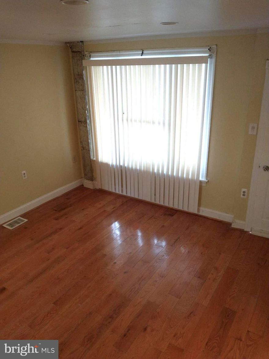 1527 S Marston St - A Grays Ferry three bedroom and one bathroom home. Harwood floors throughout the first floor and the  three bedrooms. Full sized kitchen with tile floor. The basement has a washer and dryer. Pets allowed depending on size  and number of pets. Pet deposit required for all pets. Schedule a showing today! *TENANT OPEN HOUSE ON 4/26/25 @ 12PM-1PM*