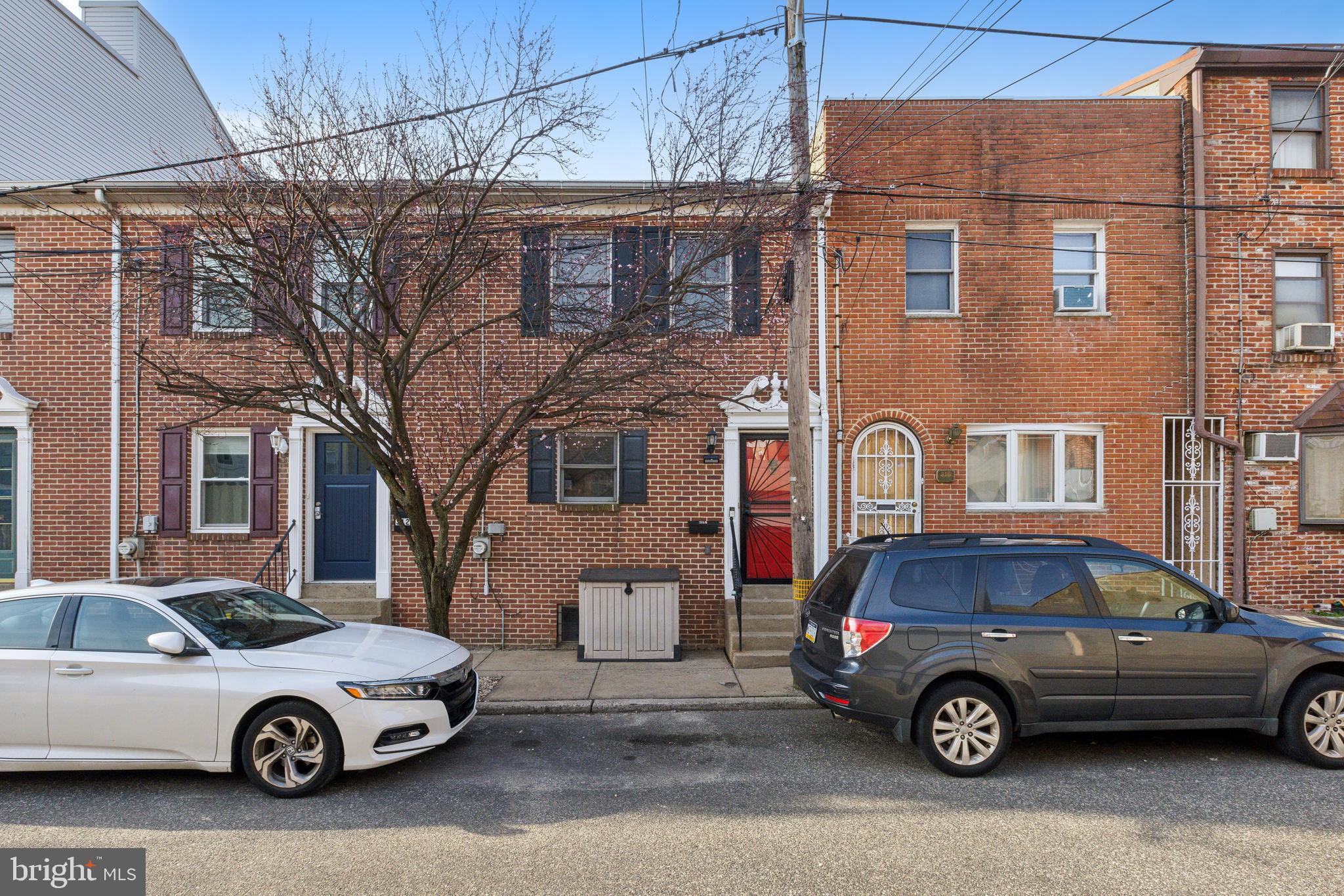 Welcome to 314 Sears St, not your typical Philadelphia rowhome tucked away on a quiet Pennsport block. Sears street is 16 feet wide! From the moment you step inside, the extra width shows on every level. The first floor offers a welcoming entry with a spacious coat closet, flowing into an open living and dining area. Real hardwood floors, recessed lighting, stainless steel appliances, and upgraded kitchen fixtures enhance the space, while large sliding glass doors open to a private patio—perfect for entertaining or relaxing.
Upstairs, you’ll find two generously sized bedrooms and a full bath with a tub, all with new hardwood flooring. Each bedroom boasts ample closet space and natural light. The basement has tall ceilings and is primed to be finished! It provides plenty of room for storage as well as a convenient laundry area. Recent updates include a new water heater (2022), HVAC system (2024) and washer/dryer (2024), among other thoughtful improvements.
This home is only steps away from Herman's for your morning coffee (a local favorite!). Close to public transit, Herron park, Jefferson Square, Dickinson Square and excellent eateries such as Aroma on 3rd, this well-maintained home is move-in ready for its next owner. Schedule your private tour today!