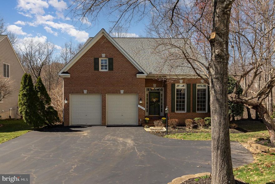 Welcome to this charming 4-bedroom home in the highly sought-after Prince William Town Center! With over 4,000 sq ft of well-maintained living space, this home offers plenty of room for everyone. The main level features a luxurious primary bedroom with a large walk-in closet, a huge tile shower, a jacuzzi tub, and a double vanity. The open floor plan includes a formal living room with a cozy gas fireplace and 10' ceiling, a large eat-in kitchen, and an attached 2-car garage. You’ll find newly applied custom interior paint throughout the home, adding a fresh and stylish touch to every room. Step outside to your private deck, complete with a retractable awning and serene views of nature – perfect for relaxation and entertaining. The fully finished basement provides additional space, including an extra bedroom, a full bathroom, a rec room with a fireplace, a movie room, and a walkout backyard entrance. Located in a friendly community with amenities like a pool, playgrounds, and a community center, this home is just waiting for you to move in. Don’t miss out on this hidden gem! Schedule a showing today and see all that this beautiful home has to offer.