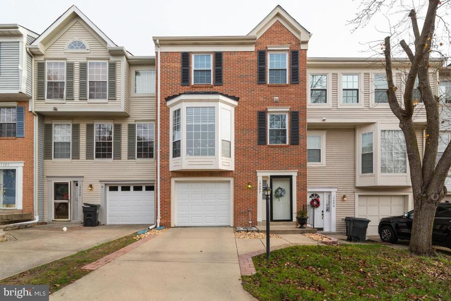 Beautiful large townhome in very desirable Dumfries location. Minutes to 95 rt 1 and other major commuter routes. Home has been meticulously cared for  and many outstanding features make this a perfect 10. Gourmet Kitchen with bump out for additional eat in space with island and updated stainless appliances. Large open living room with hardwood floors and tons of natural light.  Large primary bedroom with spacious walk in closet and master bath with soaking tub and updated shower. All bathrooms in the home have been updated including lower level 1/2 bath.  Large family room on lower level with seperate door allows privacy and added family space. 1 car garage and driveway for off street parking. Home is in beautiful condition.  Must see!. will not last. Offers bring reviewed evening of 12-26.