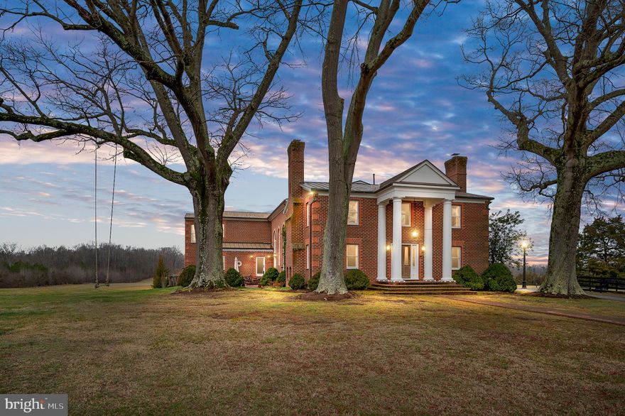 PRICE REDUCTION!! Welcome to this Grand Estate located just off Route 33 in Western Hanover County. Offering luxurious living, convenience and privacy, this large brick home is situated on 20+ acres with wonderful open interior spaces ideal for both entertaining and family living, with six well sized bedrooms, seven baths and two Roman tubs. The primary suite, with its own private porch, overlooks open acreage with a beautiful view of the western sky. Open land, ancient oak trees, horse barn, two pastures with four board fencing and a stocked pond just begin to list the properties features. With a large inground pool and three patios, your choice for enjoying the land and stunning sunsets is limitless. In addition, the property offers easy access to plentiful wildlife for the sportsman as well all close proximity to the South Anna River. Two large outbuildings provide endless opportunities for various interests or event spaces.