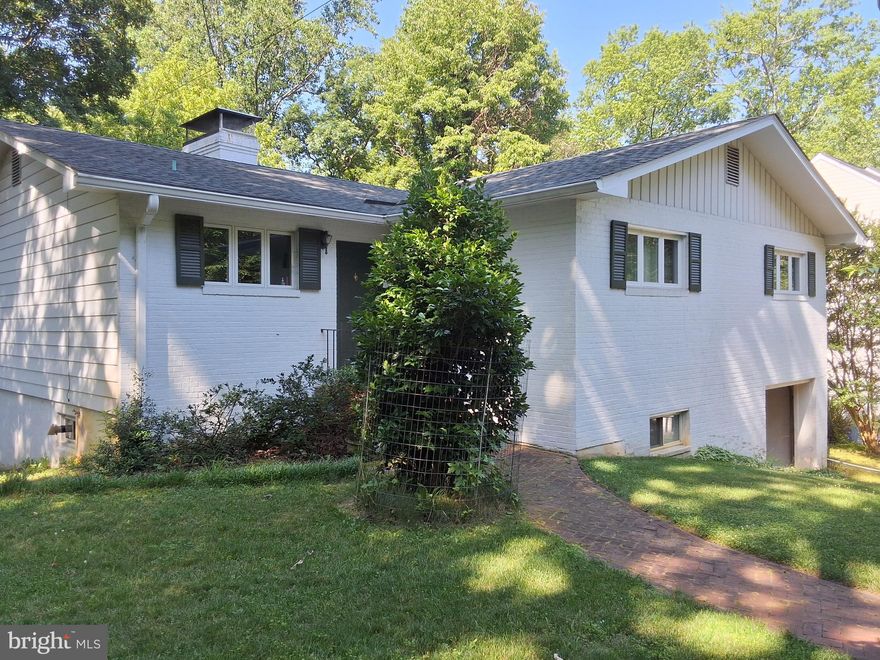 This lovely rancher in the water privileged, amenity rich neighborhood of Annapolis Roads boasts 5 bedrooms and  3 full bathrooms.  Privately and peacefully situated in a canopy of beautiful mature trees  and walking distance to the neighborhood beach, vacation will feel permanent!

 The main level is wonderful  for entertaining and offers a charming double sided fireplace in the living  and dining room, hardwood flooring , walls of windows and a fantastic screened in porch and deck for the nature lovers viewing! The kitchen boasts granite countertops, ample cabinet space and room for casual dining! The lower level offers two additonal bedrooms , a full bath and a spacious second living room with a walkout - a teenagers dream!!!

 Annapolis Roads is a vibrant community offering a sandy beach, waterfront pavilion, firepit and playground , walking and jogging trails, boat ramp , kayak storage and numerous clubs and neighborhood celebrations.
There is no HOA- it is a special tax district with the tax included in annual property owners tax. Minutes from downtown Annapolis, shops and restaurants and close to commuting routes, this wonderful home has it all- in fact it's more than a home,  it's a lifestyle!